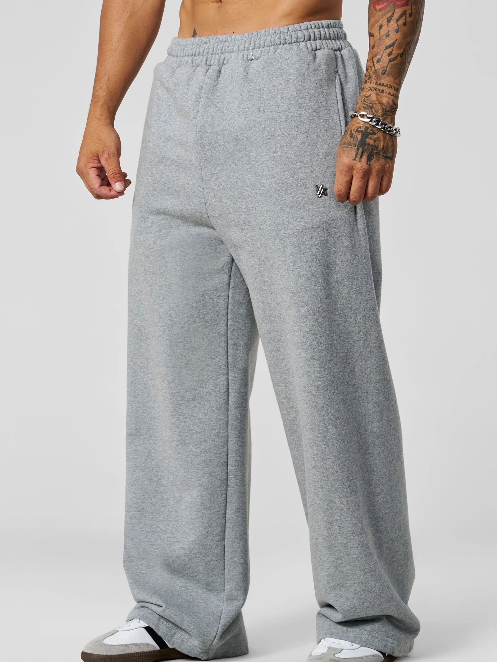 2067 - Elevated Essentials - Baggy Sweats - Baggy sweats in heavyweight cotton with relaxed silhouette, structured drape, soft feel, and subtle 'Elevated' detailing in colour Heather Grey.