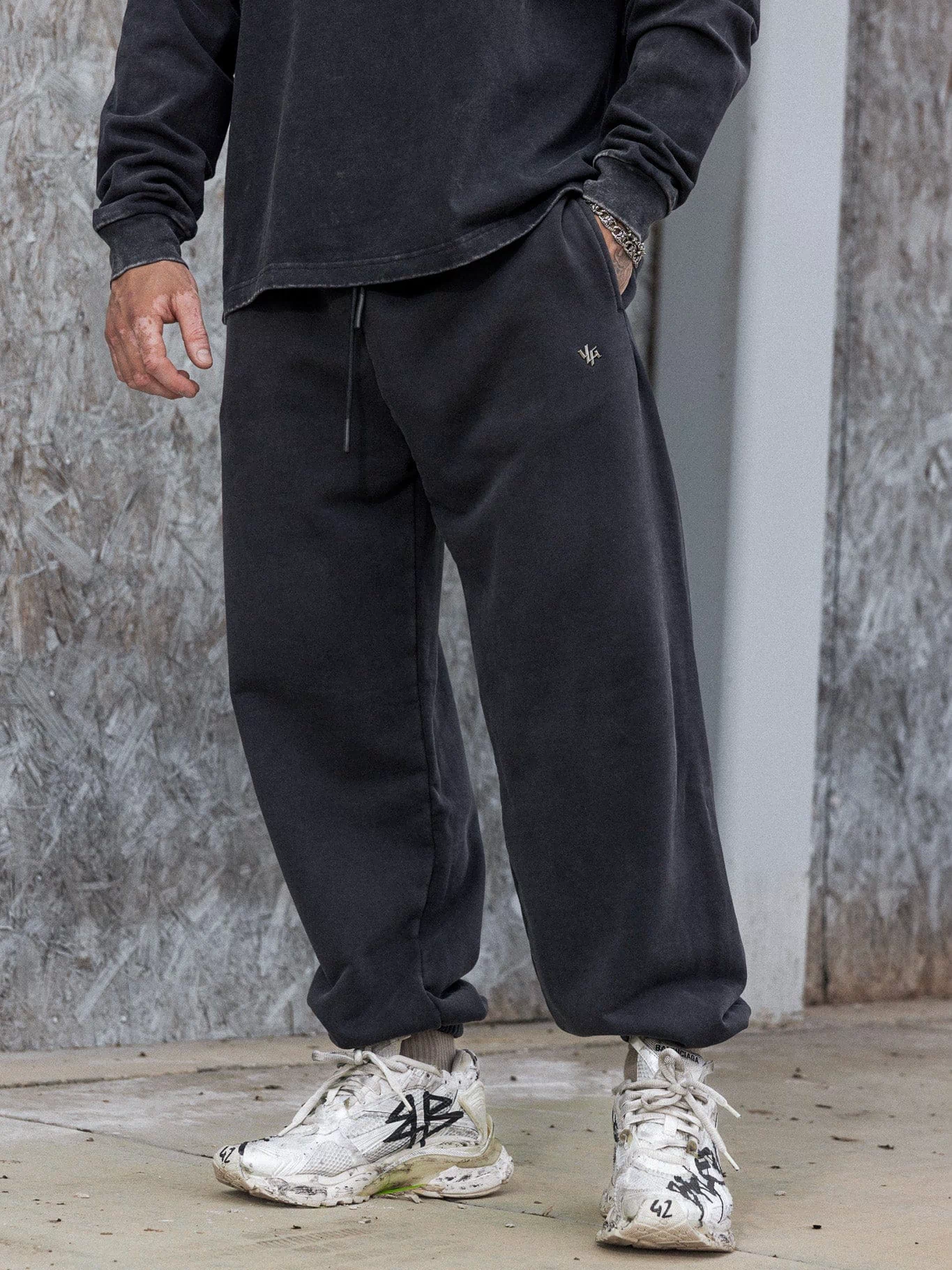 2069 - Elevated Essentials - Baggy Joggers — oversized, comfortable fit with cuffed ankles, structured heavyweight cotton, and subtle “Elevated” branding for a premium, versatile look in Black Wash