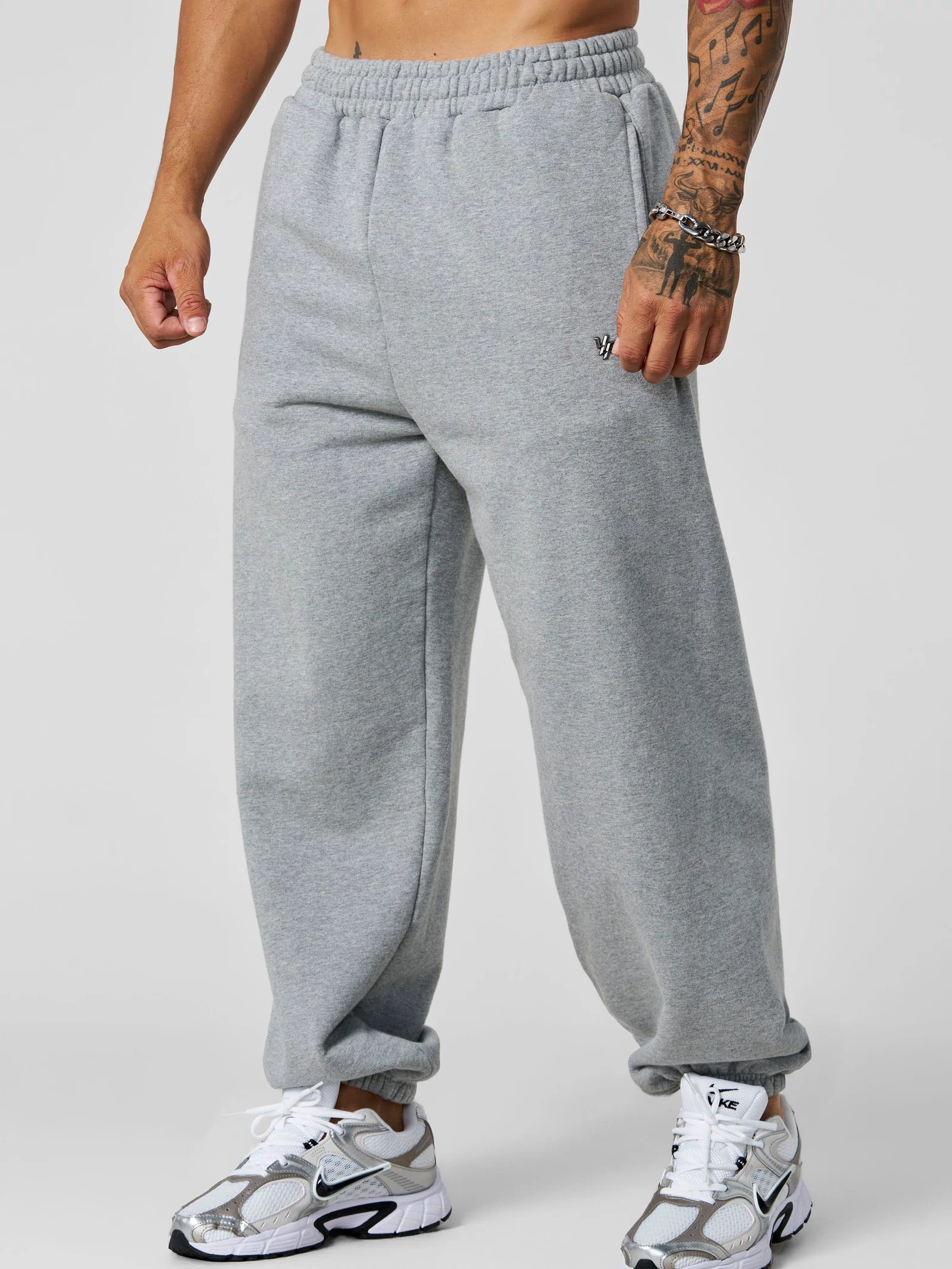 2069 - Elevated Essentials - Baggy Joggers — oversized, comfortable fit with cuffed ankles, structured heavyweight cotton, and subtle “Elevated” branding for a premium, versatile look in Heather Wash