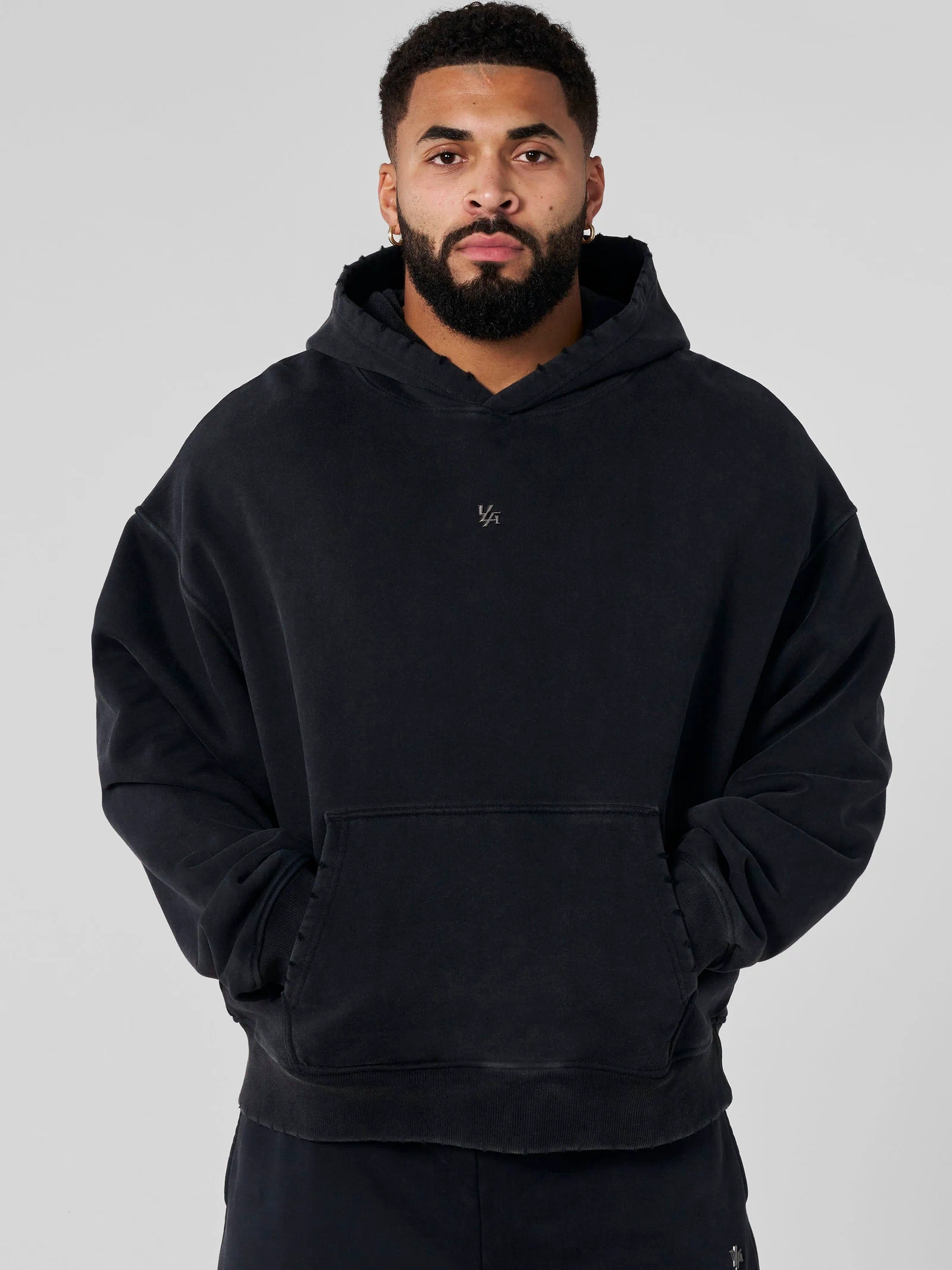 5096 - Elevated Essentials - Pullover Hoodies - Heavyweight cotton hoodie with a spacious fit, kangaroo pocket, and adjustable hood. Subtle 'Elevated' branding for a versatile, modern look in Black Wash.