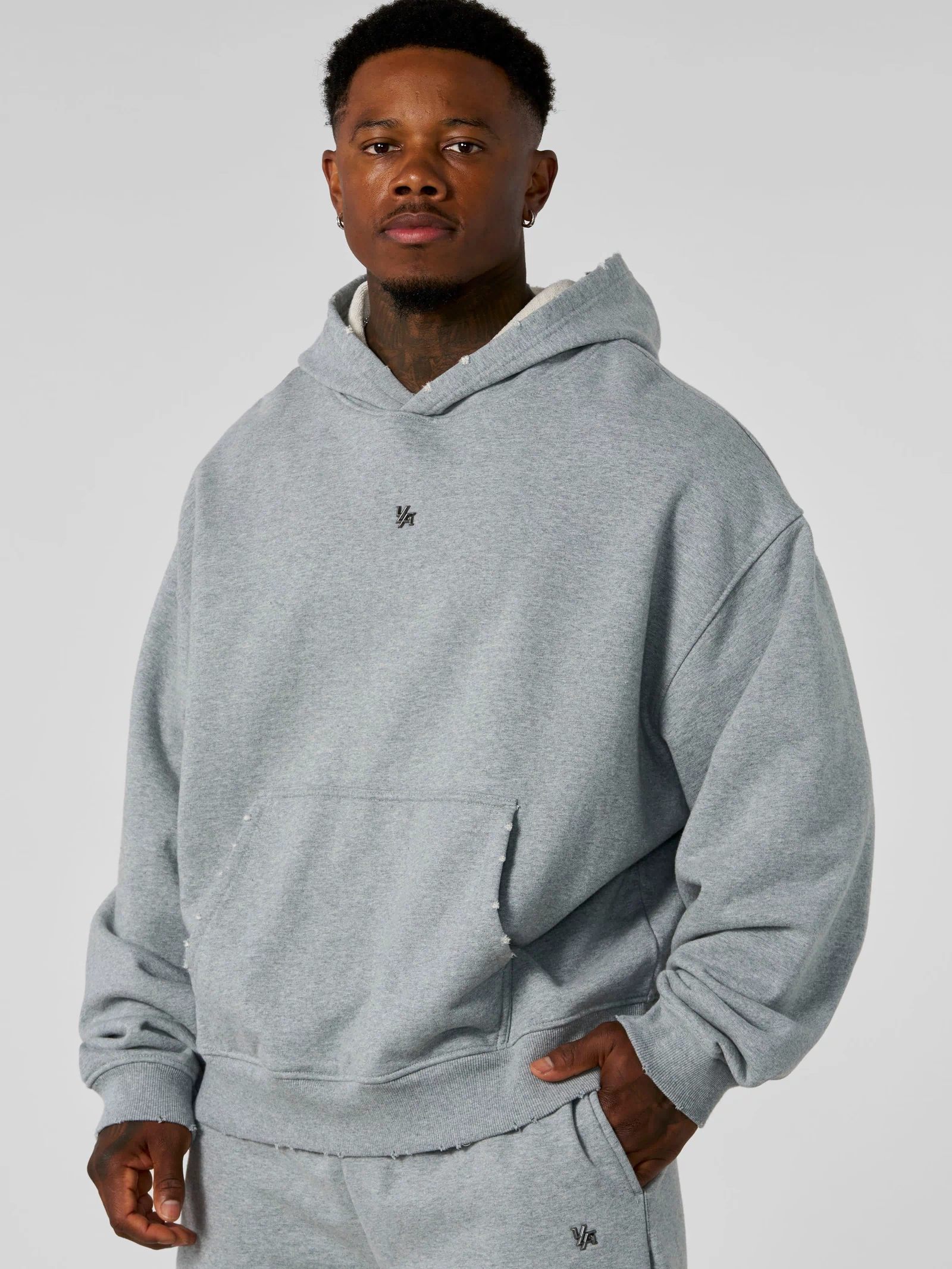 5096 - Elevated Essentials - Pullover Hoodies - Heavyweight cotton hoodie with a spacious fit, kangaroo pocket, and adjustable hood. Subtle 'Elevated' branding for a versatile, modern look in Heather Grey.