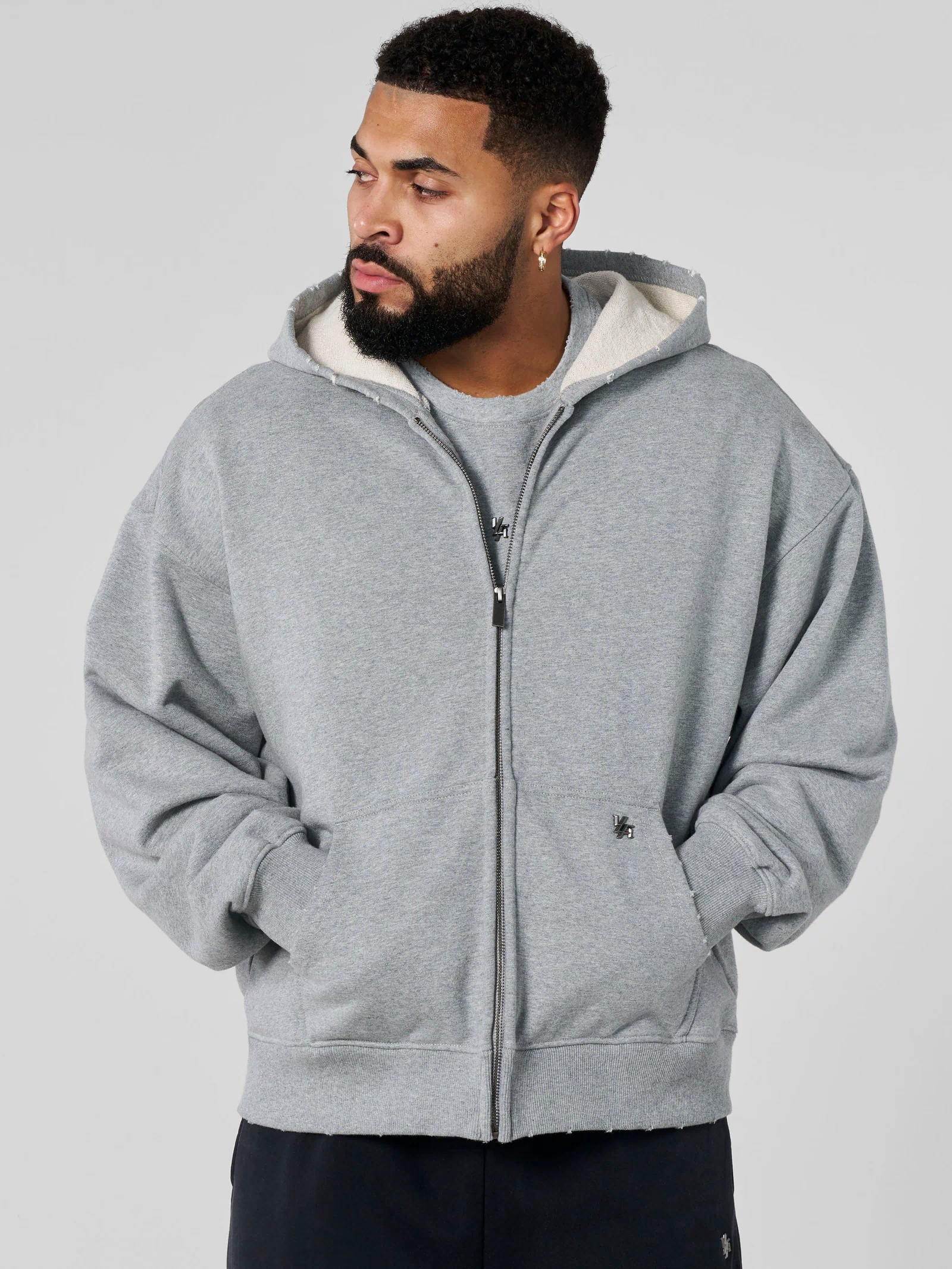 5102 - Elevated Essentials - Zip-Ups - Full-zip heavyweight terry cotton hoodie with front pockets, ribbed finishes, smooth zipper, and minimal 'Elevated' print in colour Heather Grey.