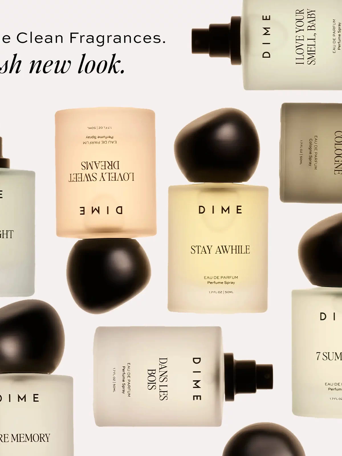Multiple DIME brand perfume bottles with black spray tops and spherical caps arranged on white background.