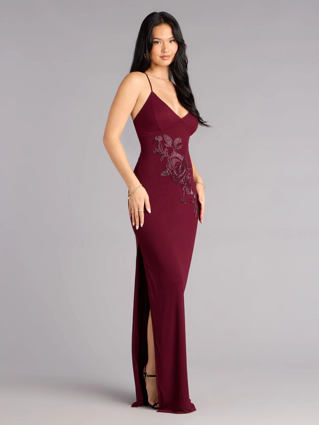 It’s the adjustable lace-up detail and wine vibe that’ll have you glowing—the Adriane Beaded Floral Lace-Up Formal Dress is a prom dress that does the most without trying too hard.