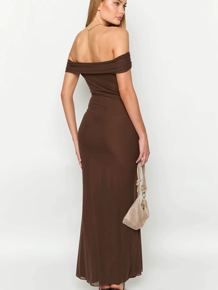 Rear view of a brown ribbed knit maxi dress with an off-shoulder neckline and ruched sleeves, fitted through the back