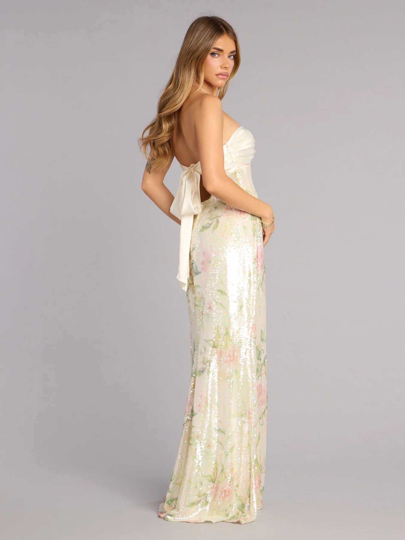 Discover a formal dress like the Angelina Satin Tie-Back Floral Sequin Formal Dress in ivory featuring a flattering fit, smooth fabric, and refined design for any formal occasion.