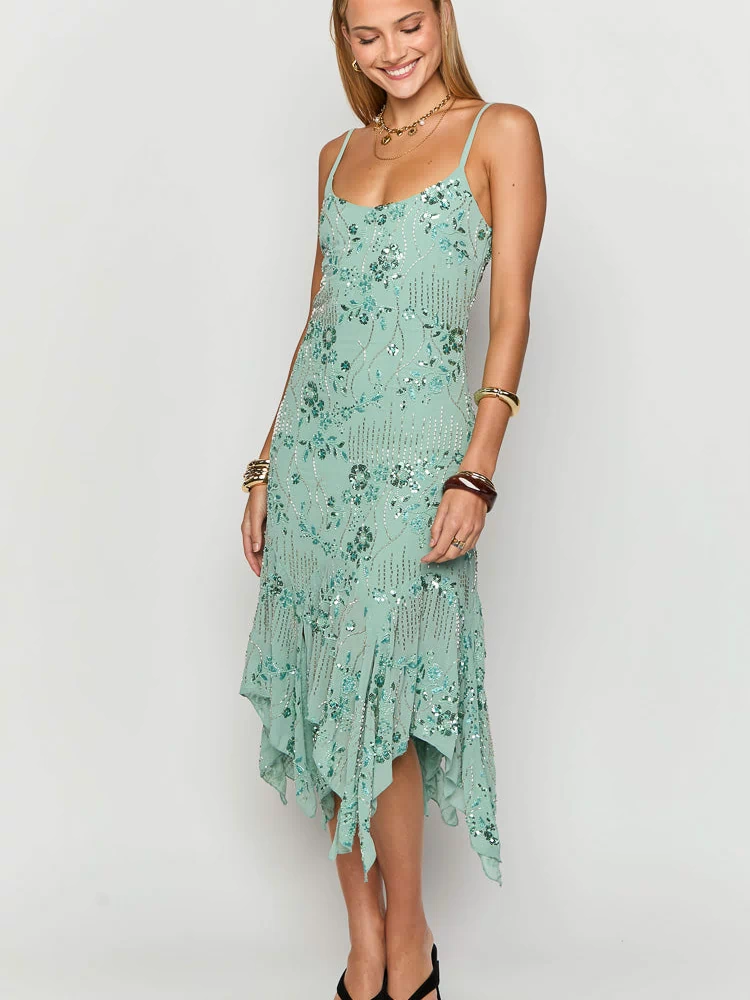 Teal sequin midi dress with spaghetti straps and a flowing handkerchief hem
