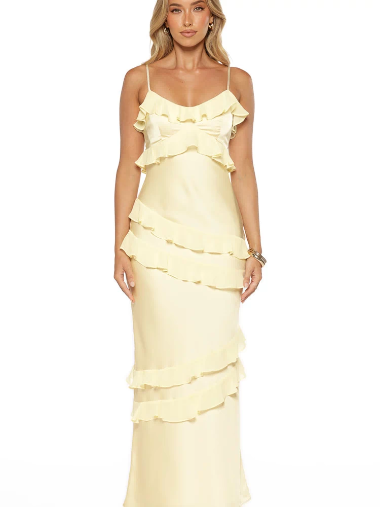 Yellow satin maxi dress with tiered ruffles on the bust and diagonal ruffles down the skirt