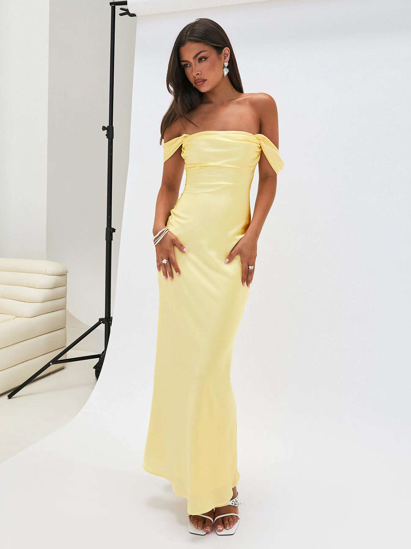 side view of model wearing Princess Polly Azura Off The Shoulder Maxi Dress Yellow Straight Neck 