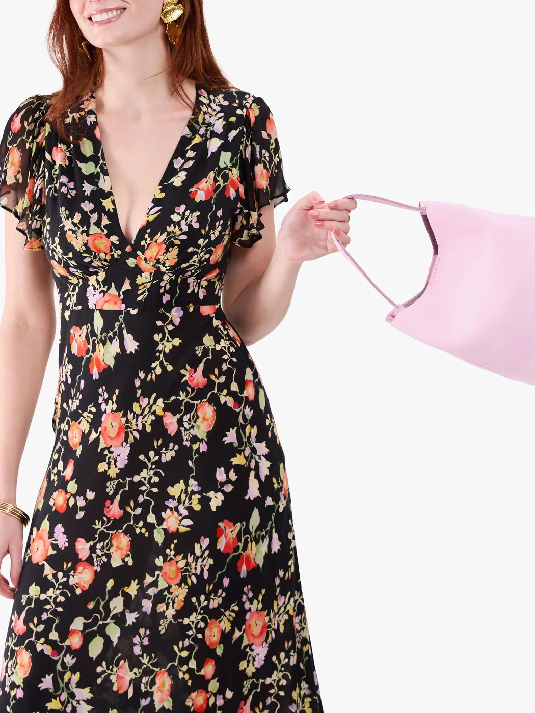 Pinkaboo*Large | Model holding symmetrical bucket bag with handle, latch closure, and removable crossbody strap