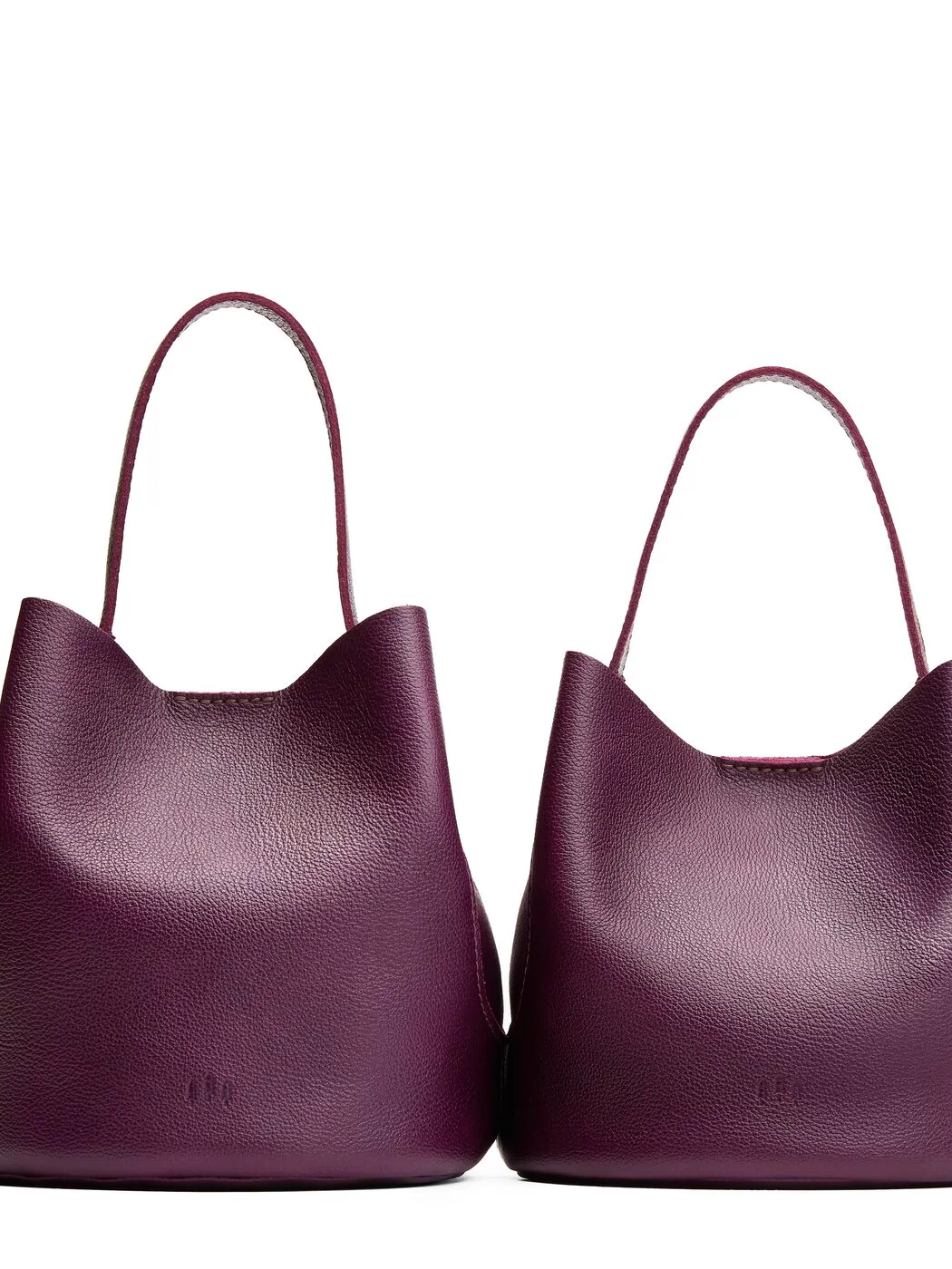 Plum | Size comparison image of two symmetrical leather bucket bags