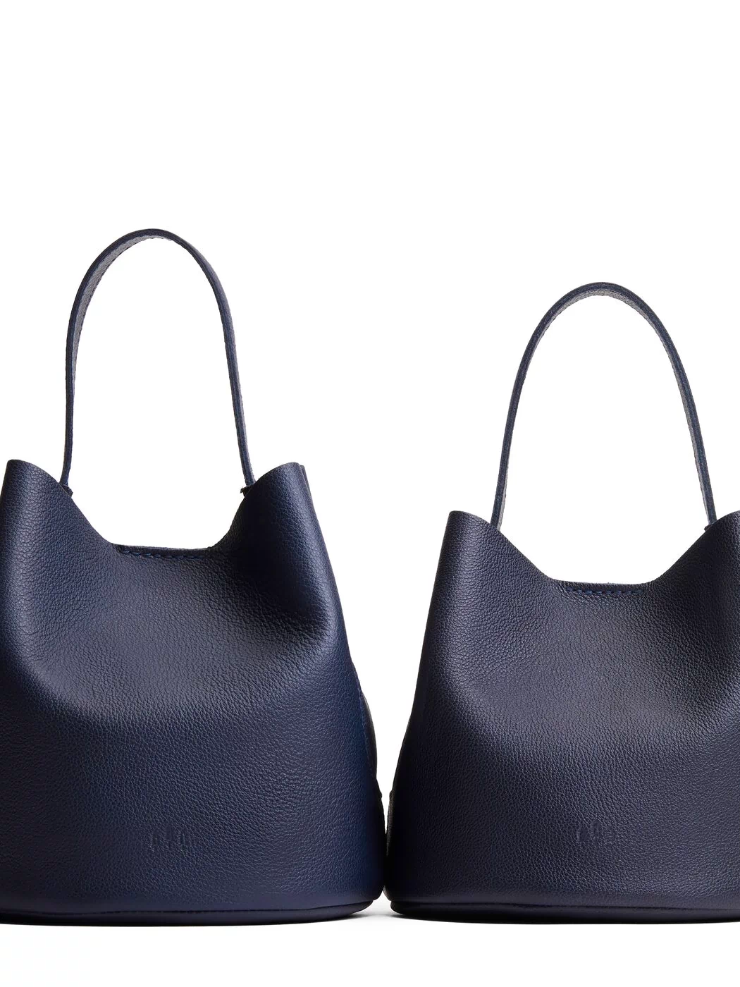 Night Owl | Size comparison image of two symmetrical leather bucket bags