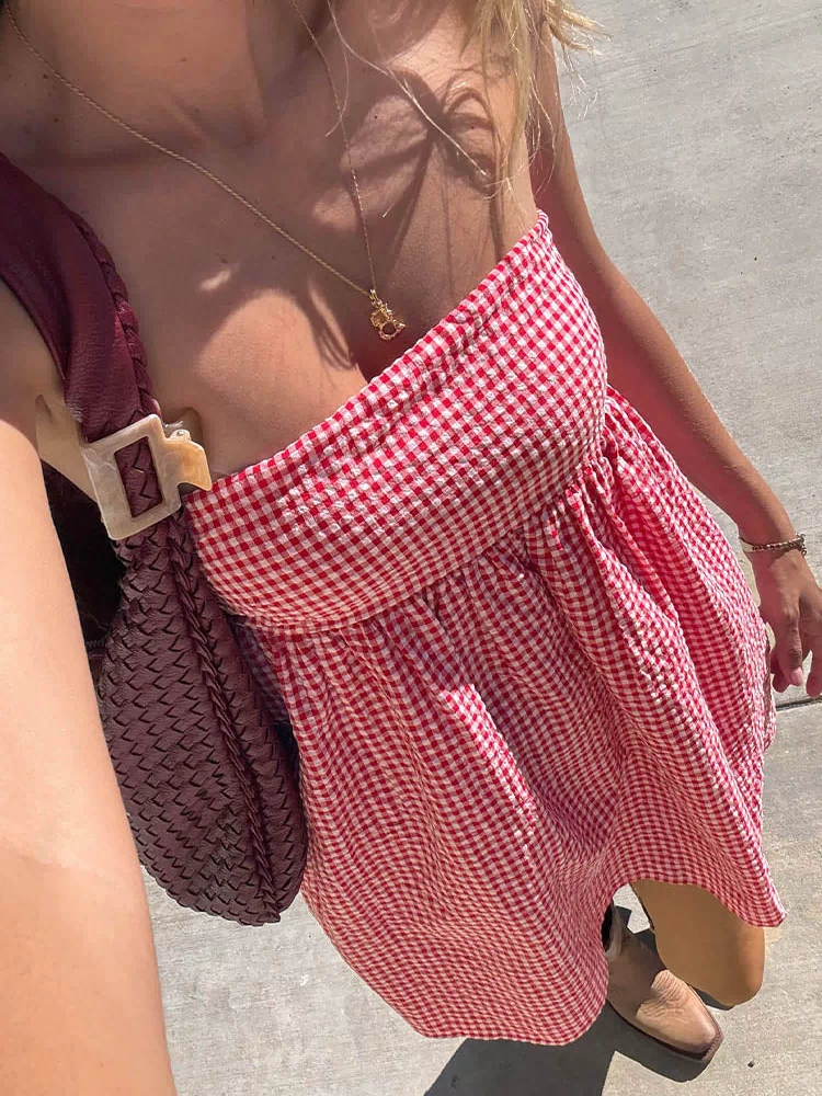 Beginning Boutique Berrie Red Gingham Strapless Mini Dress red and white gingham strapless mini dress with a shirred bust and flowy skirt