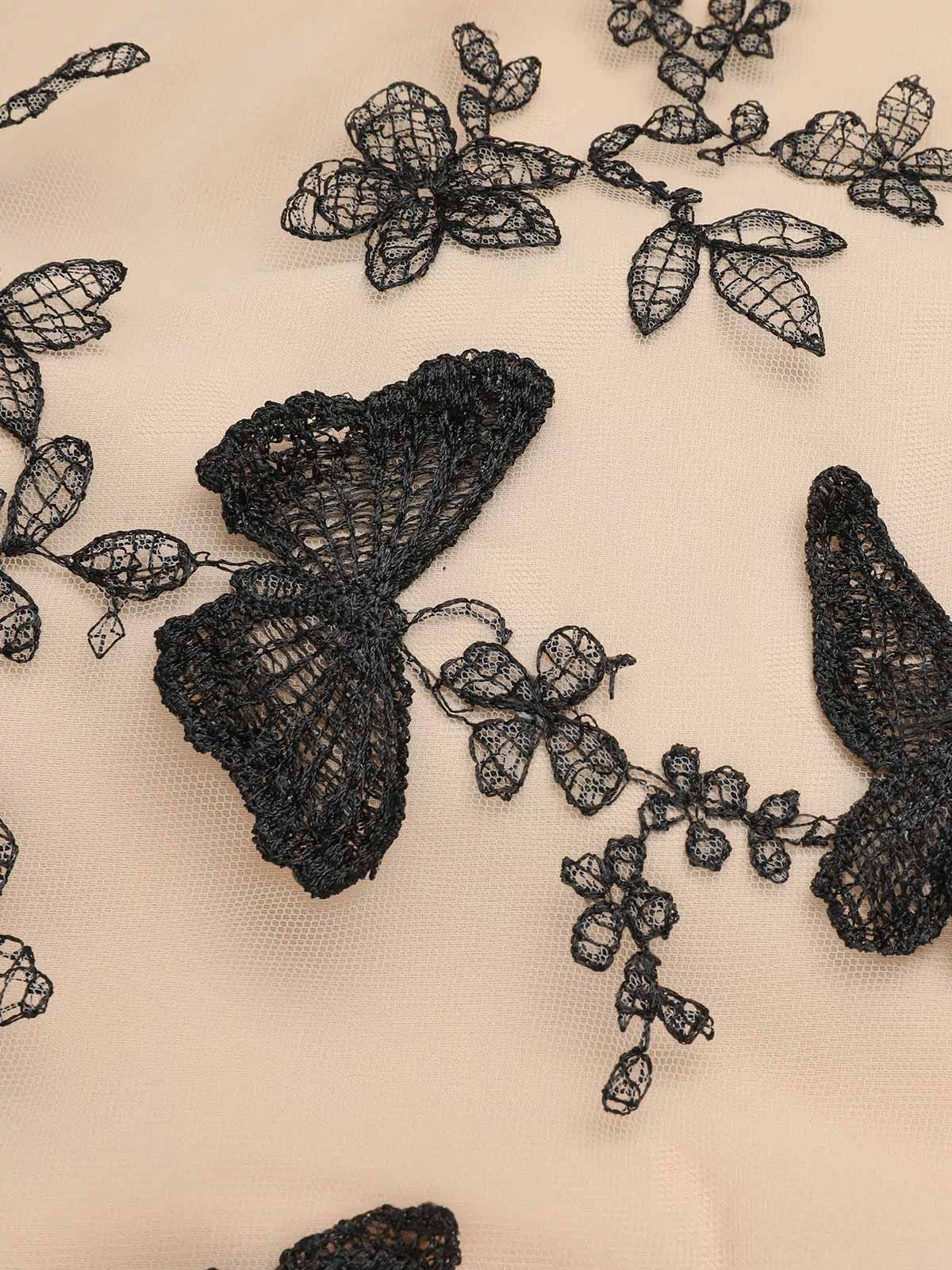 Black 1950s Butterfly Patchwork Vintage Dress — vintage elegance for the modern woman