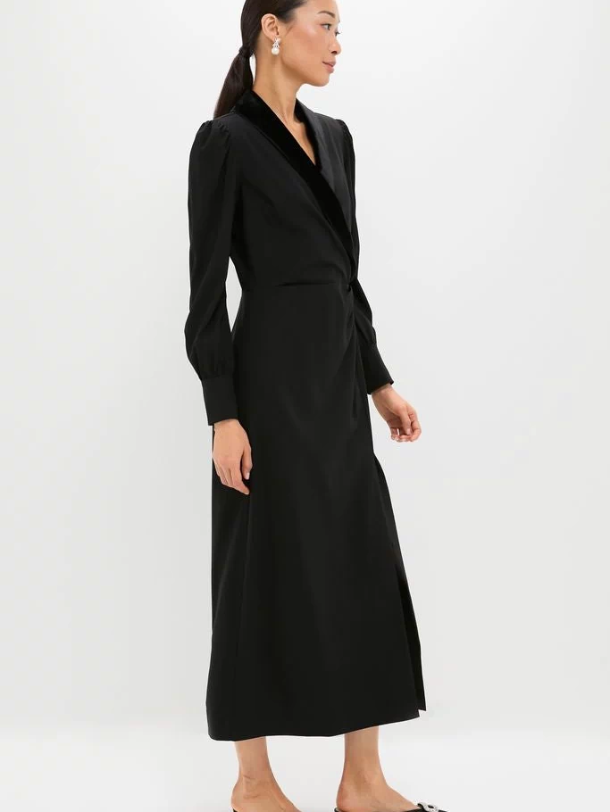 Model in a classic, high-end Black Long Sleeve Mariella Midi Dress with velvet trim and puffed shoulders, styled effortlessly with pointed-toe mules.