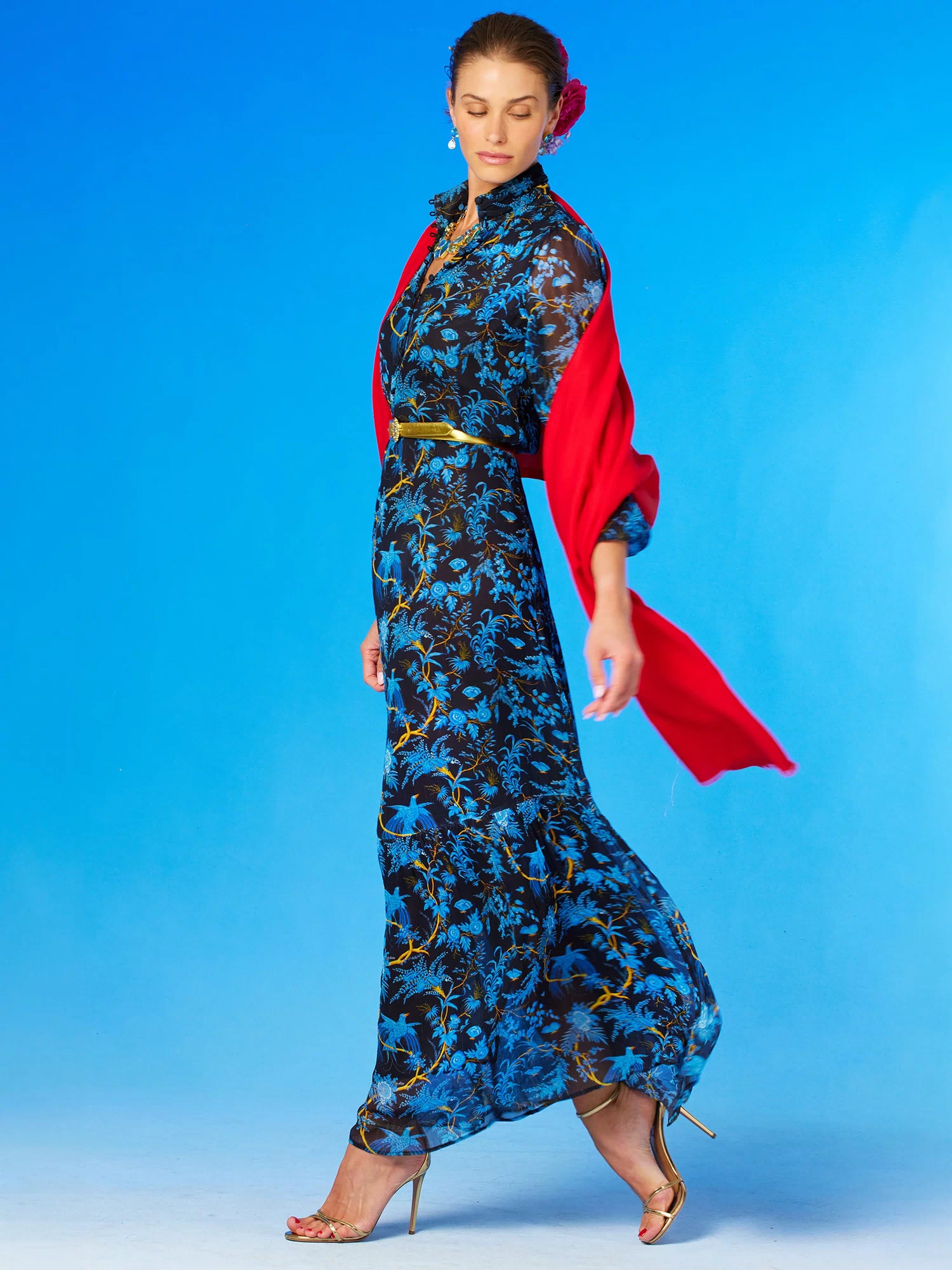 Blythe Maxi Crinkle Chiffon Dress in Midnight Garden-Side view walking with the Josephine Pashmina Red Shawl draped over the shoulders