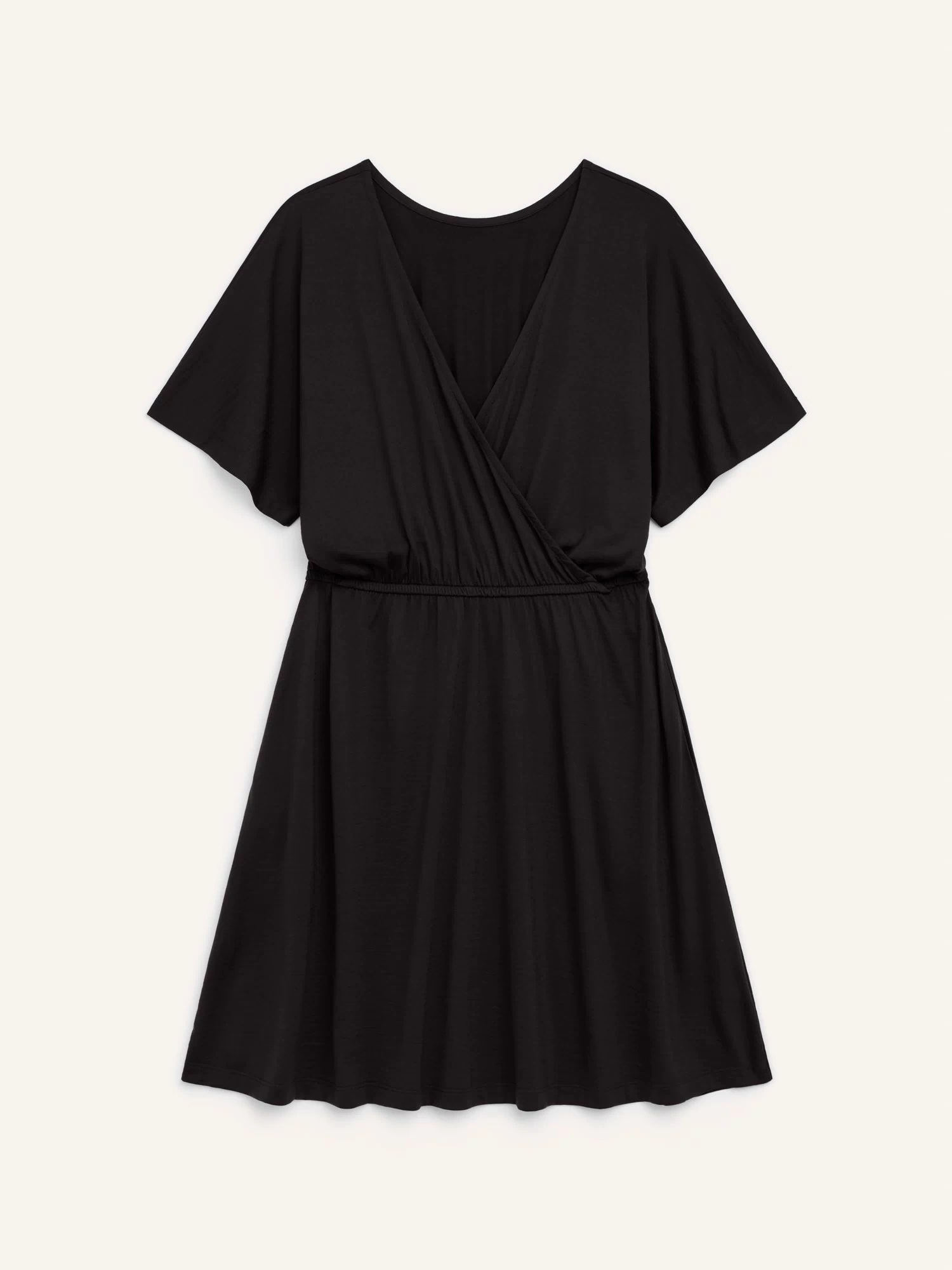Laydown of Brooklyn Reversible Dress in Black. Brooklyn Reversible Dress is a merino wool short sleeve, reversible, knee length fit & flare dress with pockets available in sizes XS-3X Regular, XS-XL Long.
