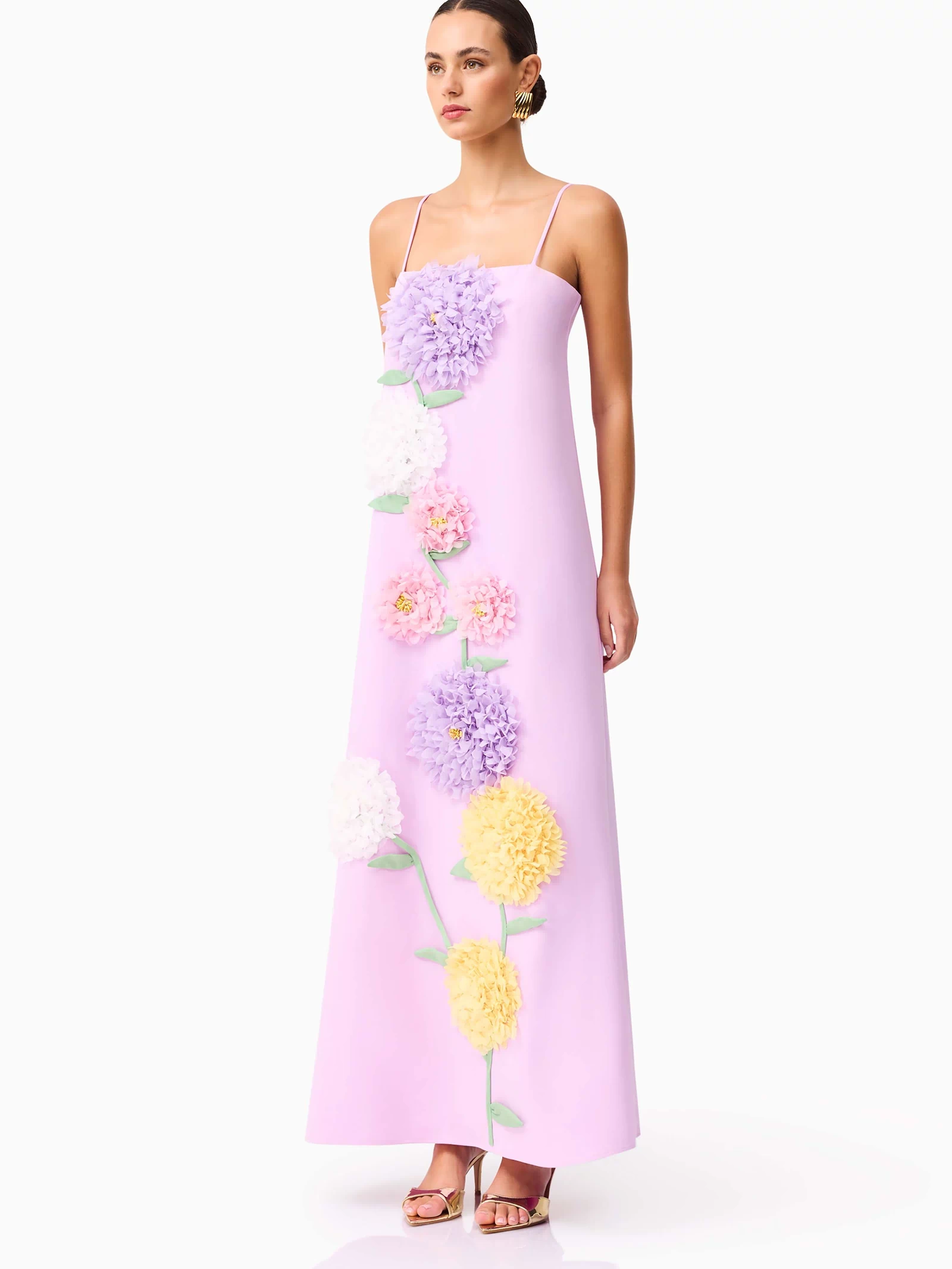 Brunette model wearing Buttercup Embroidered Maxi Dress in Purple side shot