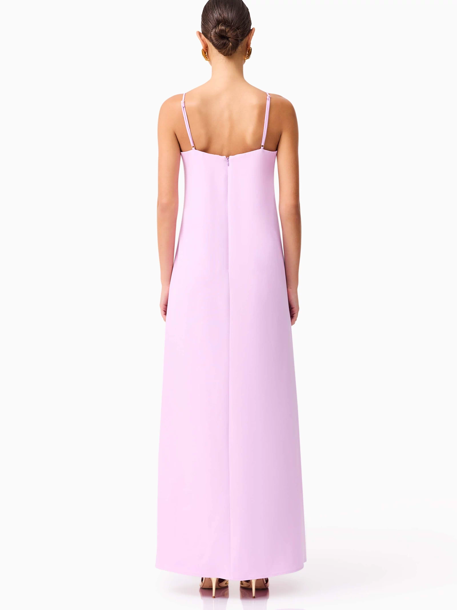 Brunette model wearing Buttercup Embroidered Maxi Dress in Purple back shot