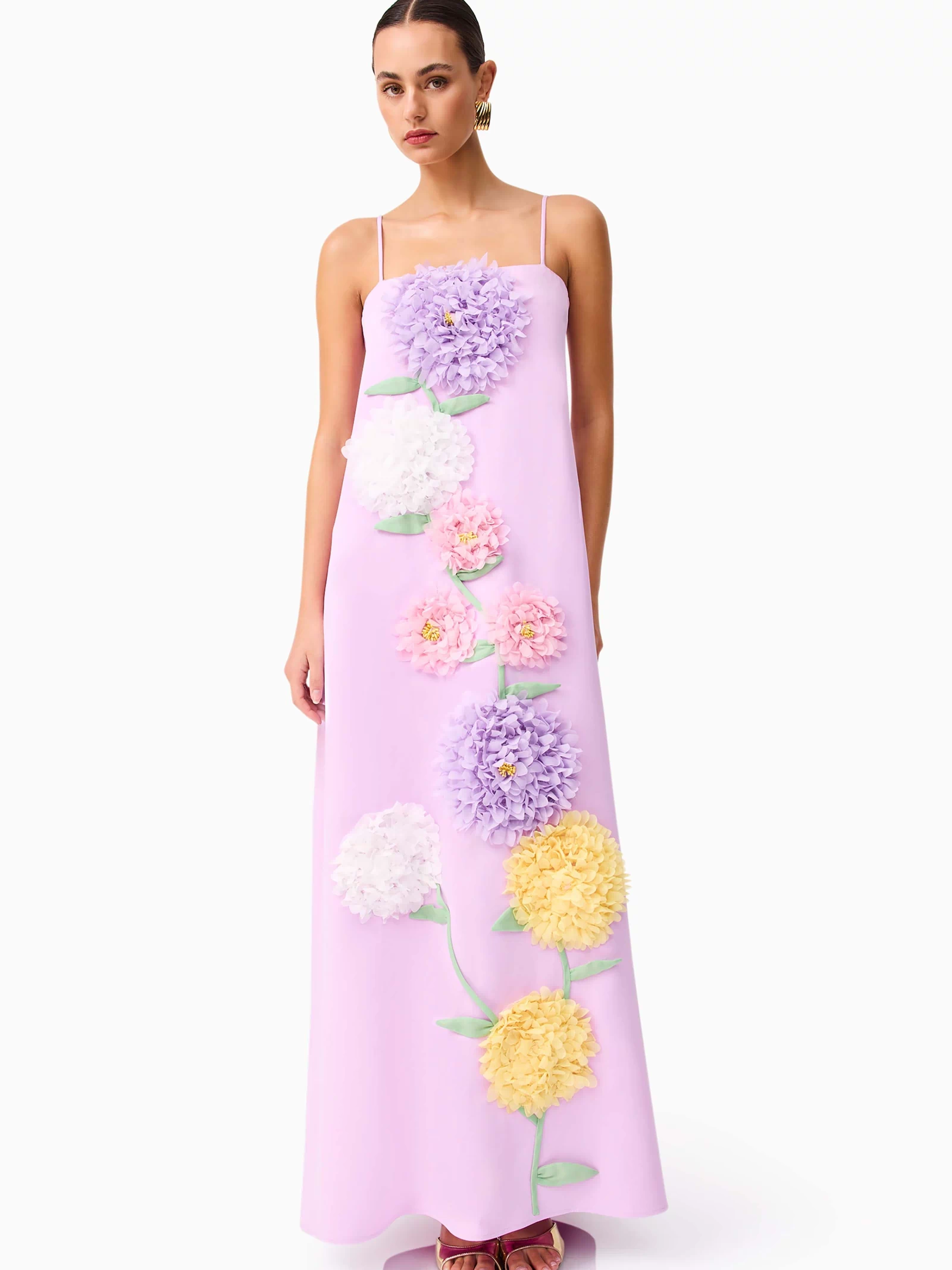 Brunette model wearing Buttercup Embroidered Maxi Dress in Purple posed shot