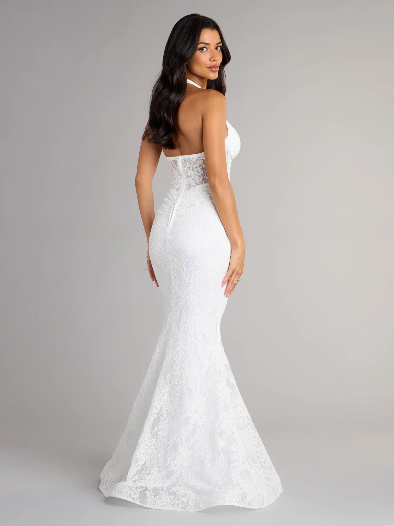 Style your seasonal looks with the Cadie Halter Corset Slit Lace Formal Dress, with new and unqiue details exclusive to Windsor's Prom Dress edit.