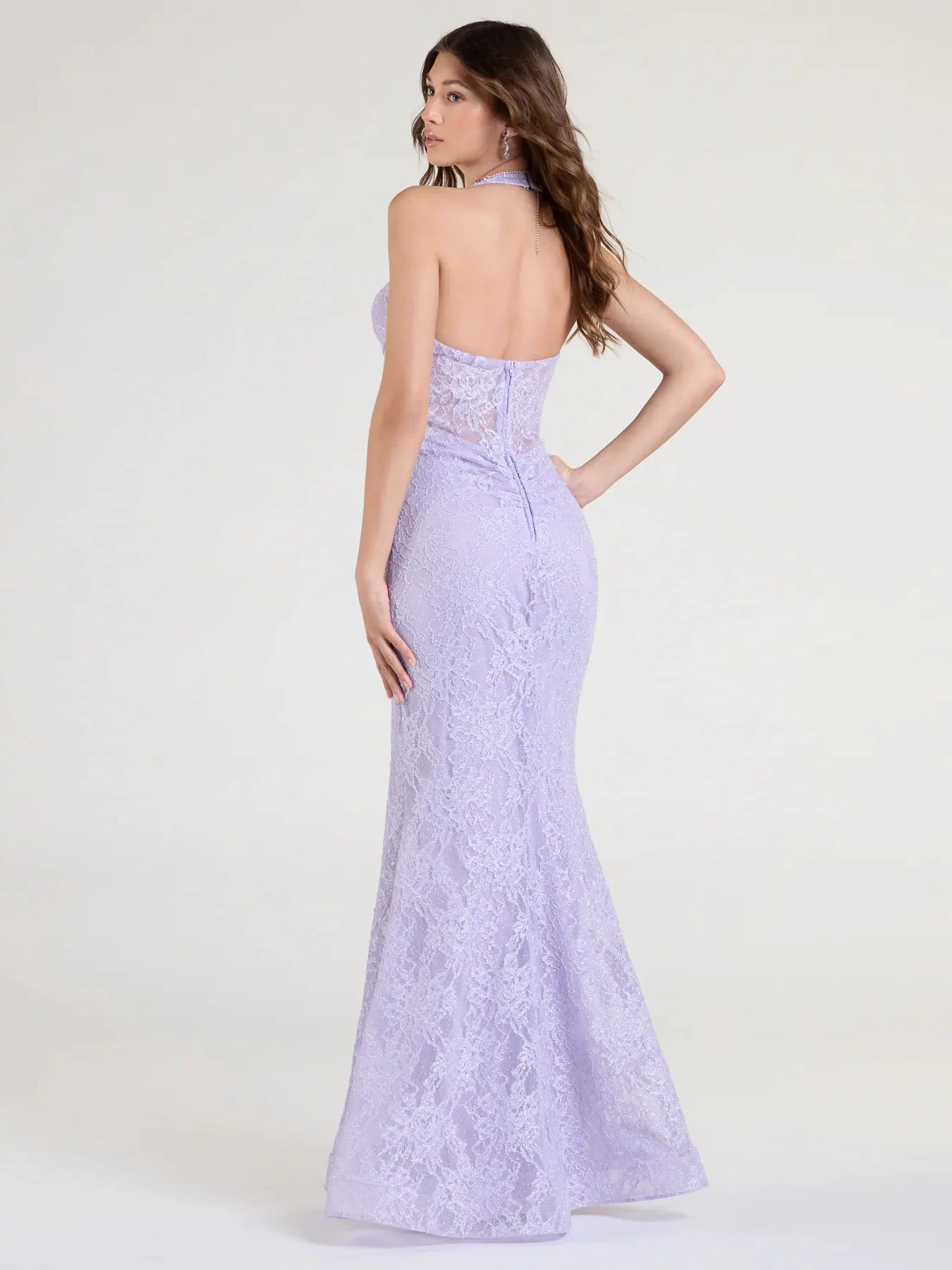 The Cadie Halter Corset Slit Lace Formal Dress is a lavender prom dress that blends trend-forward design with a flattering fit, perfect for celebrating your night with confidence.