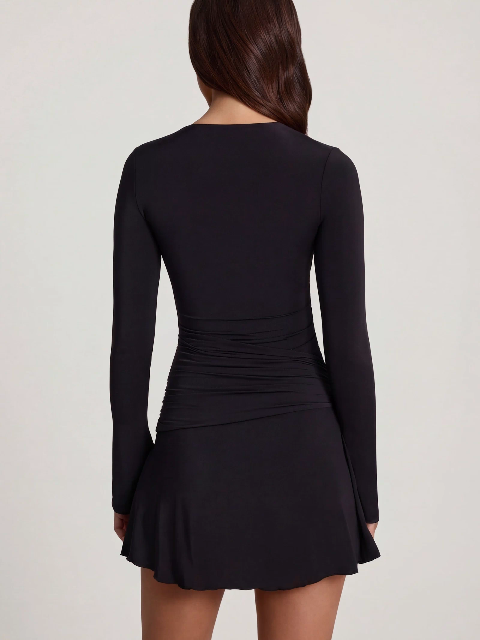 Oh Polly's Roberta wearing the Carielle Mini Dress in Black Sheer Jersey fabric perfect for a night out