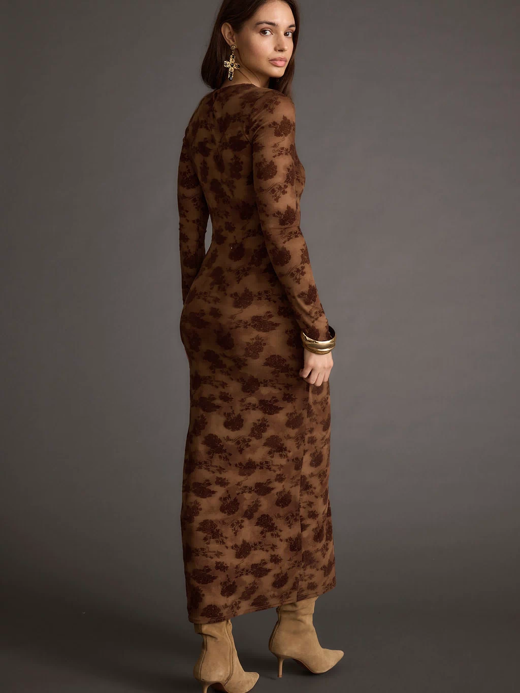 Back view of the brown maxi dress showing the silhouette and fit.