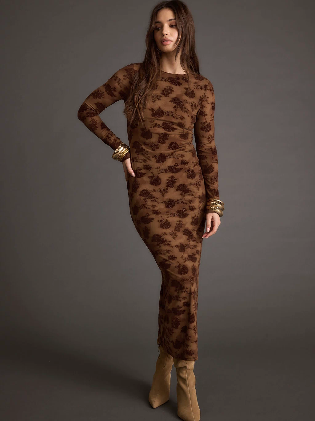 Lifestyle shot of the brown maxi dress styled for day-to-night versatility.