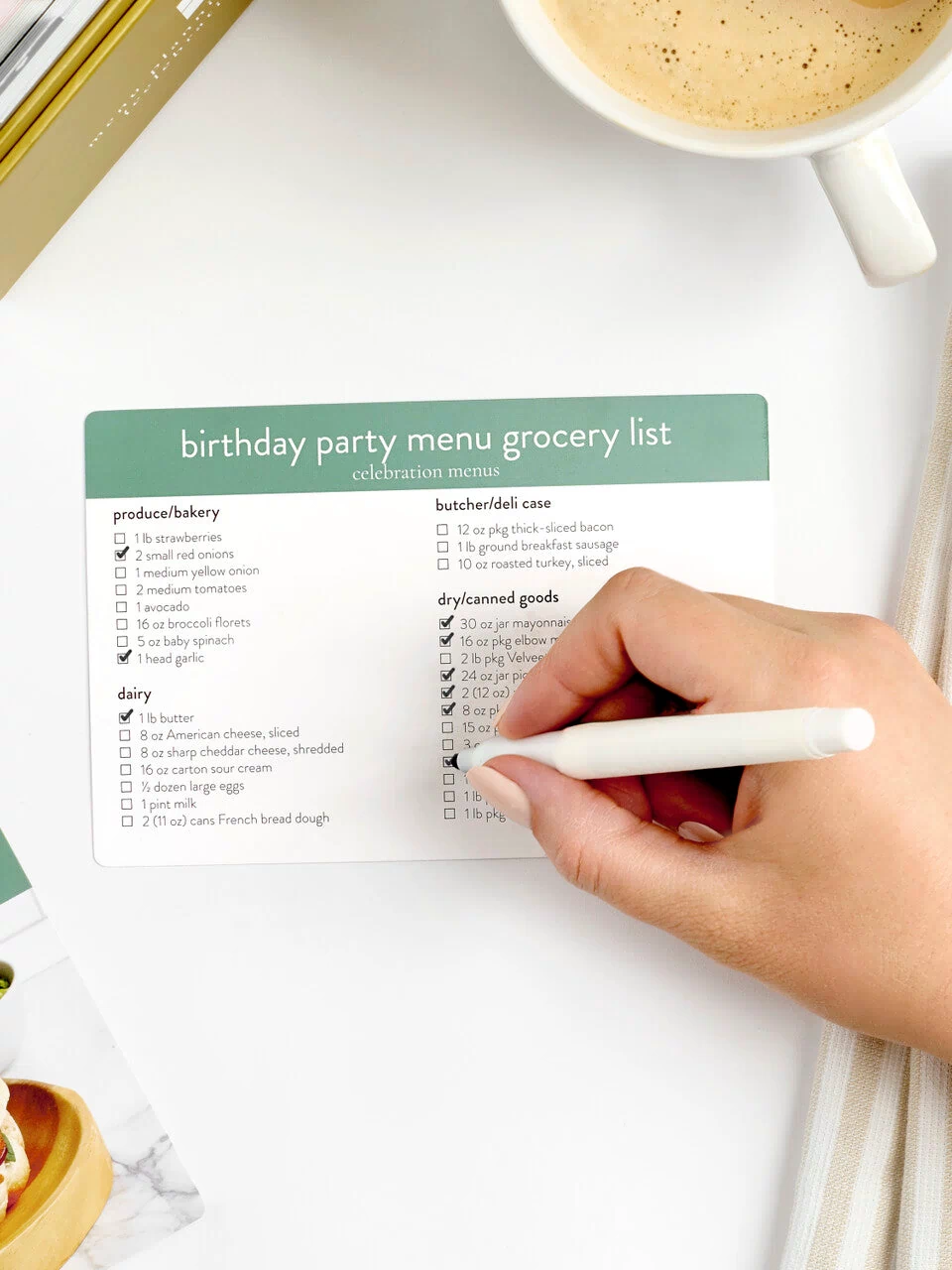 celebration menu box with grocery list writing in