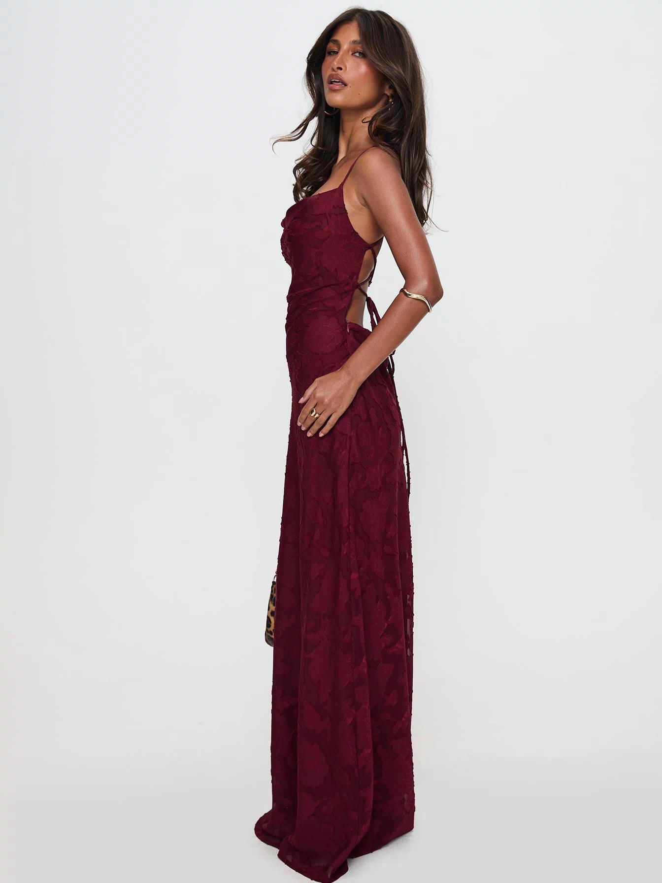 side view of model wearing Princess Polly Celena Maxi Dress Burgundy Cowl Neck 
