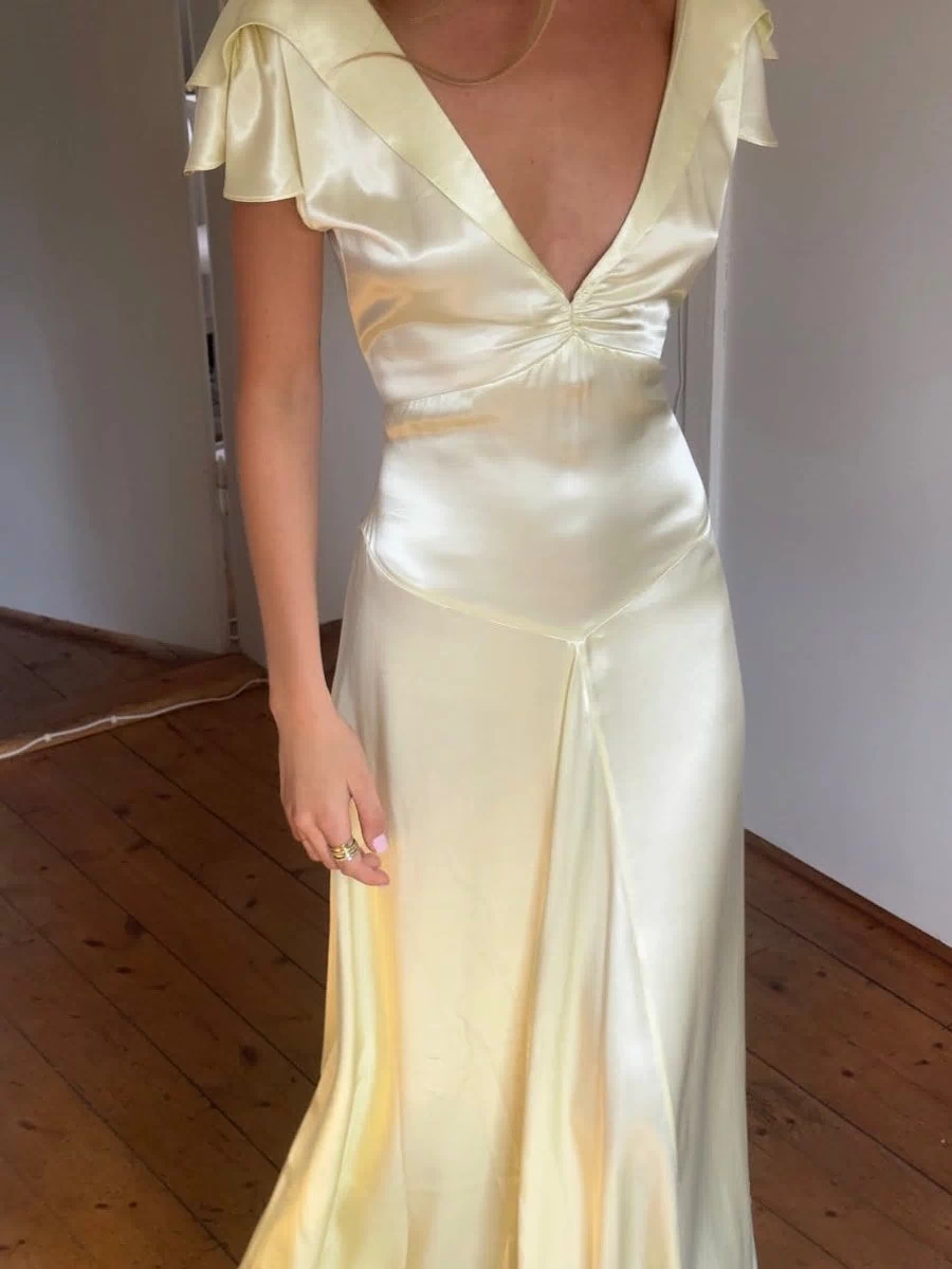 Charming A Line Deep V Neck Light Yellow Long Prom Dress with Open Back