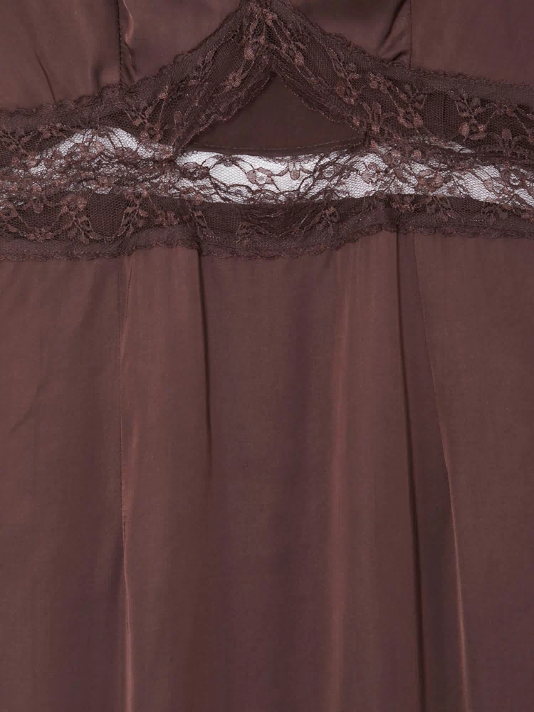 Chocolate Mimi Dress detail highlighting the intricate brown lace trim and under-bust cutout design.