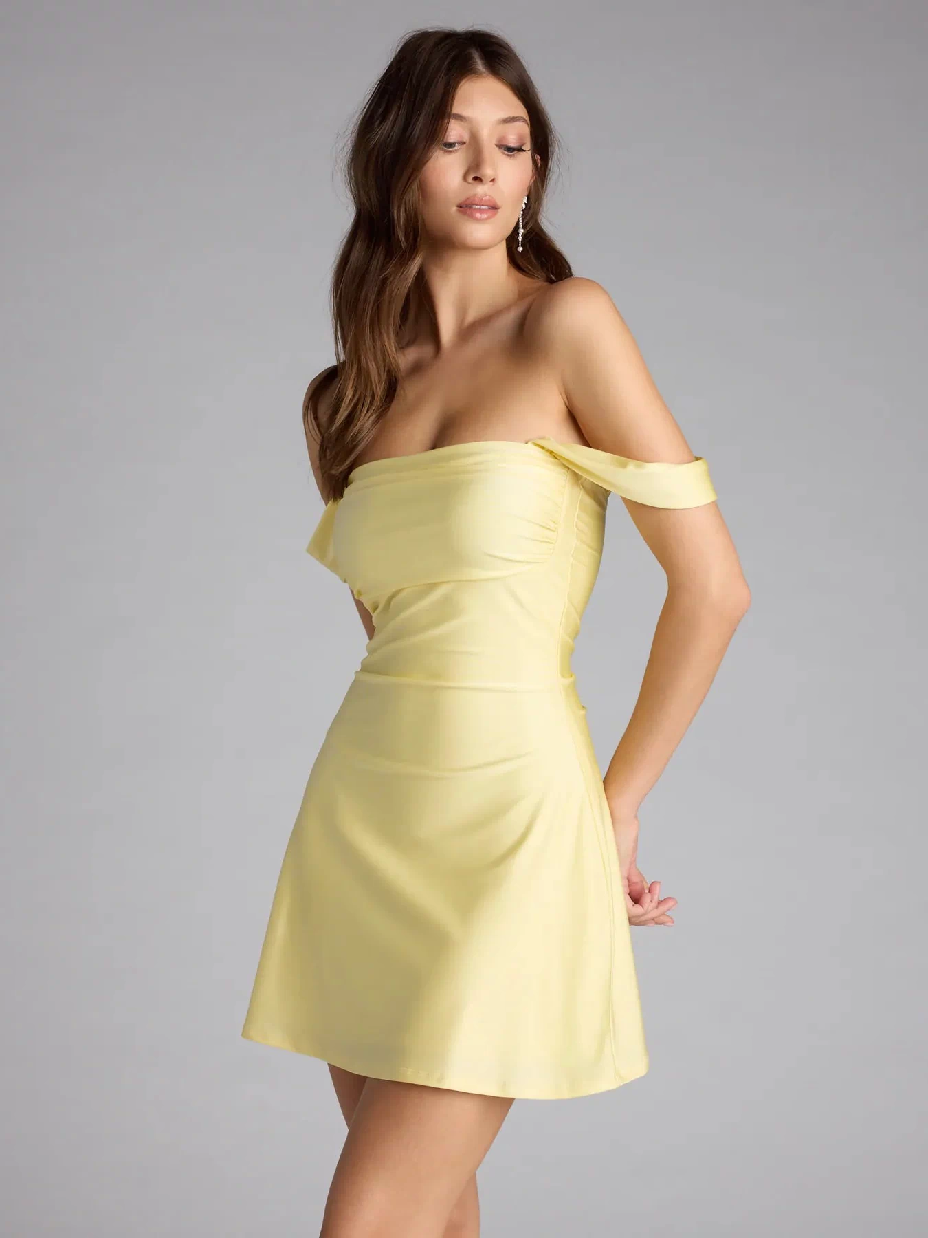 Feel ready for every dance floor moment or feed-worthy reel in the Classics Lover Off-The-Shoulder Satin A-Line Mini Dress, a yellow homecoming dress designed to own your moment.
