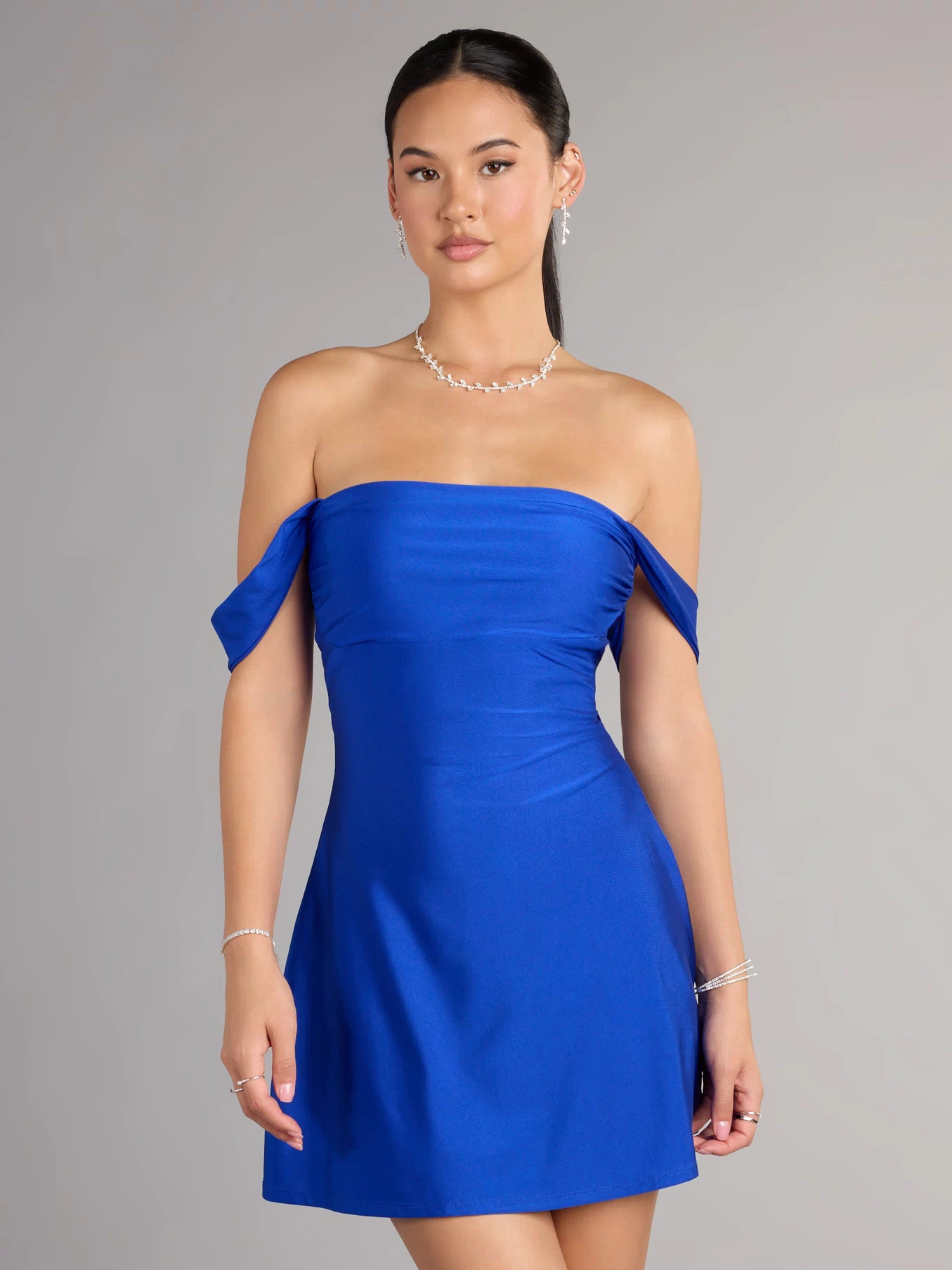 The Classics Lover Off-The-Shoulder Satin A-Line Mini Dress is your new go-to Windsor dress—effortless, versatile, and made to update your spring or summer style in seconds.