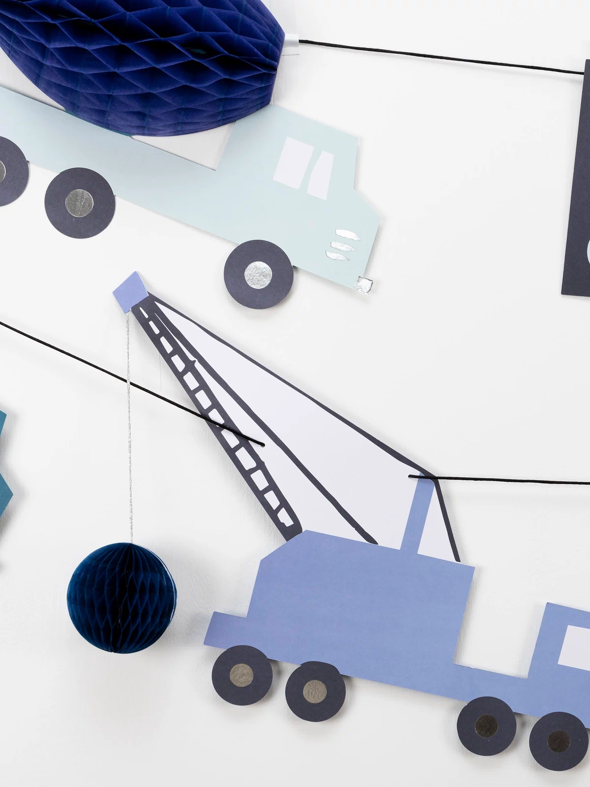 Our colorful paper garland is perfect for a construction party. Image3