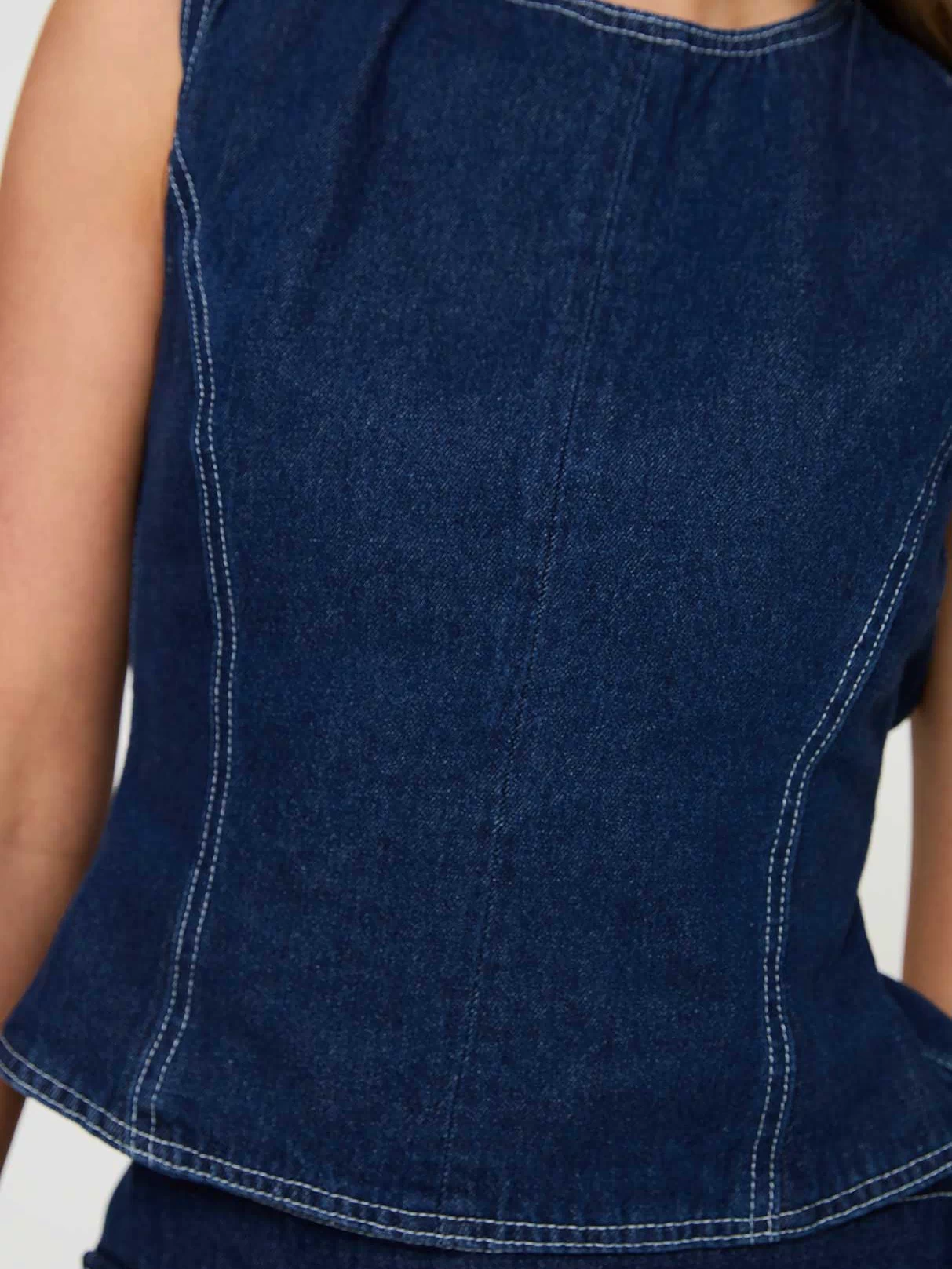 back view of model wearing Princess Polly Countryside Top Denim Sleeveless Crew Neck 