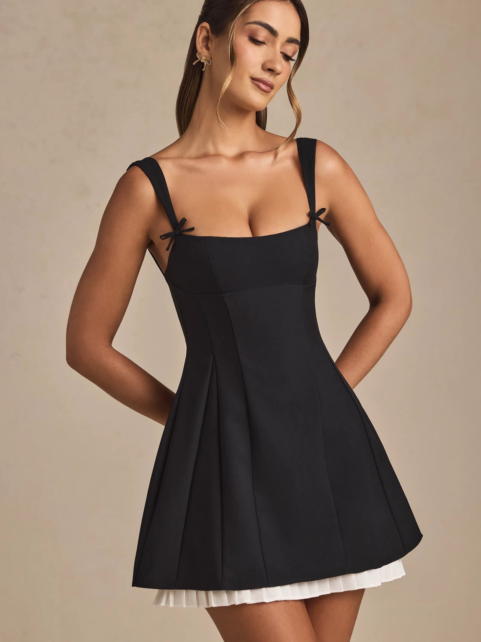 Bow-Detail Pleated A-Line Mini Dress in Black