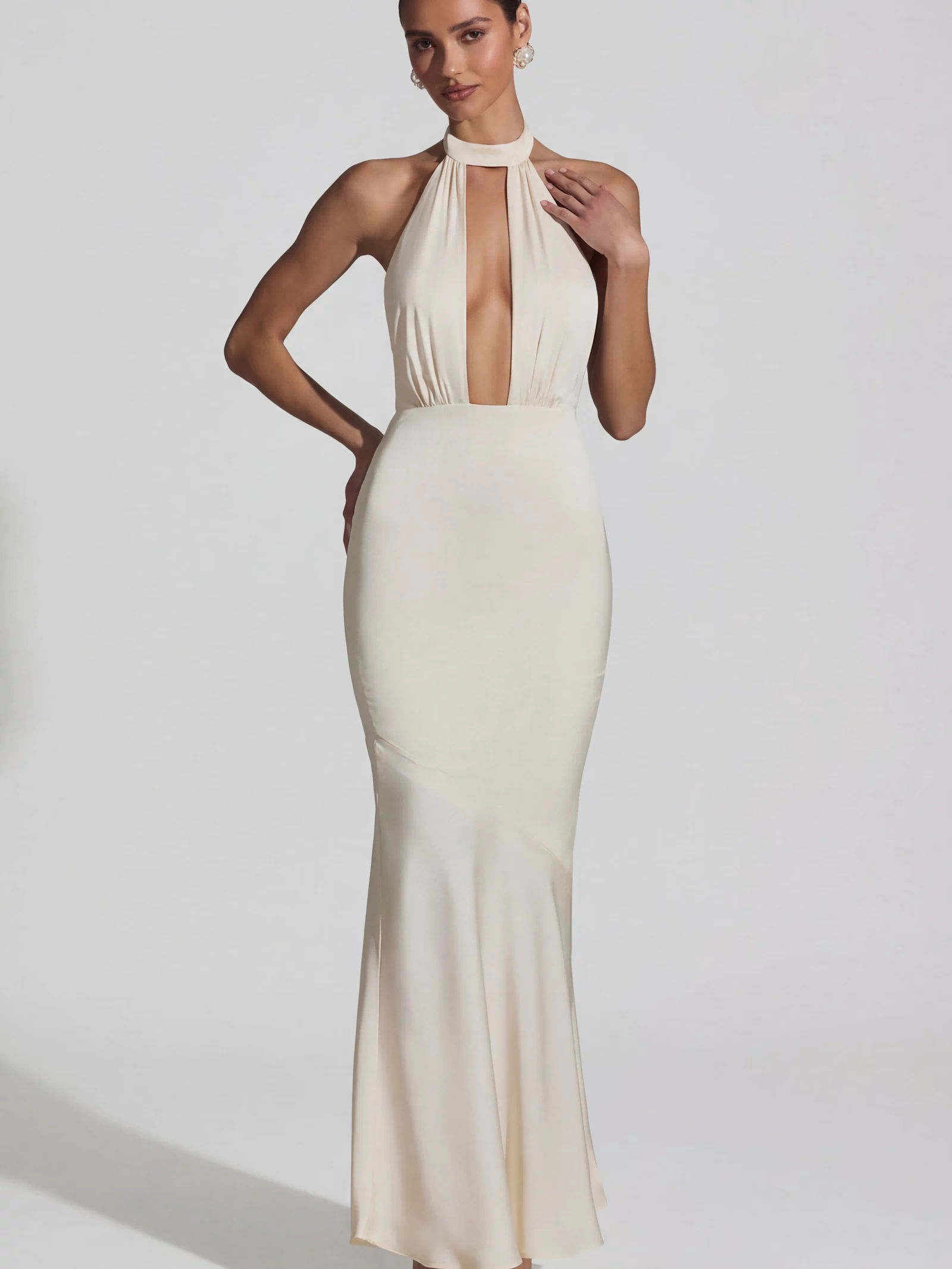 Oh Polly's Priscilla wearing the Desiree Gown Length Dress in Ivory Satin fabric perfect for luxury gala nights