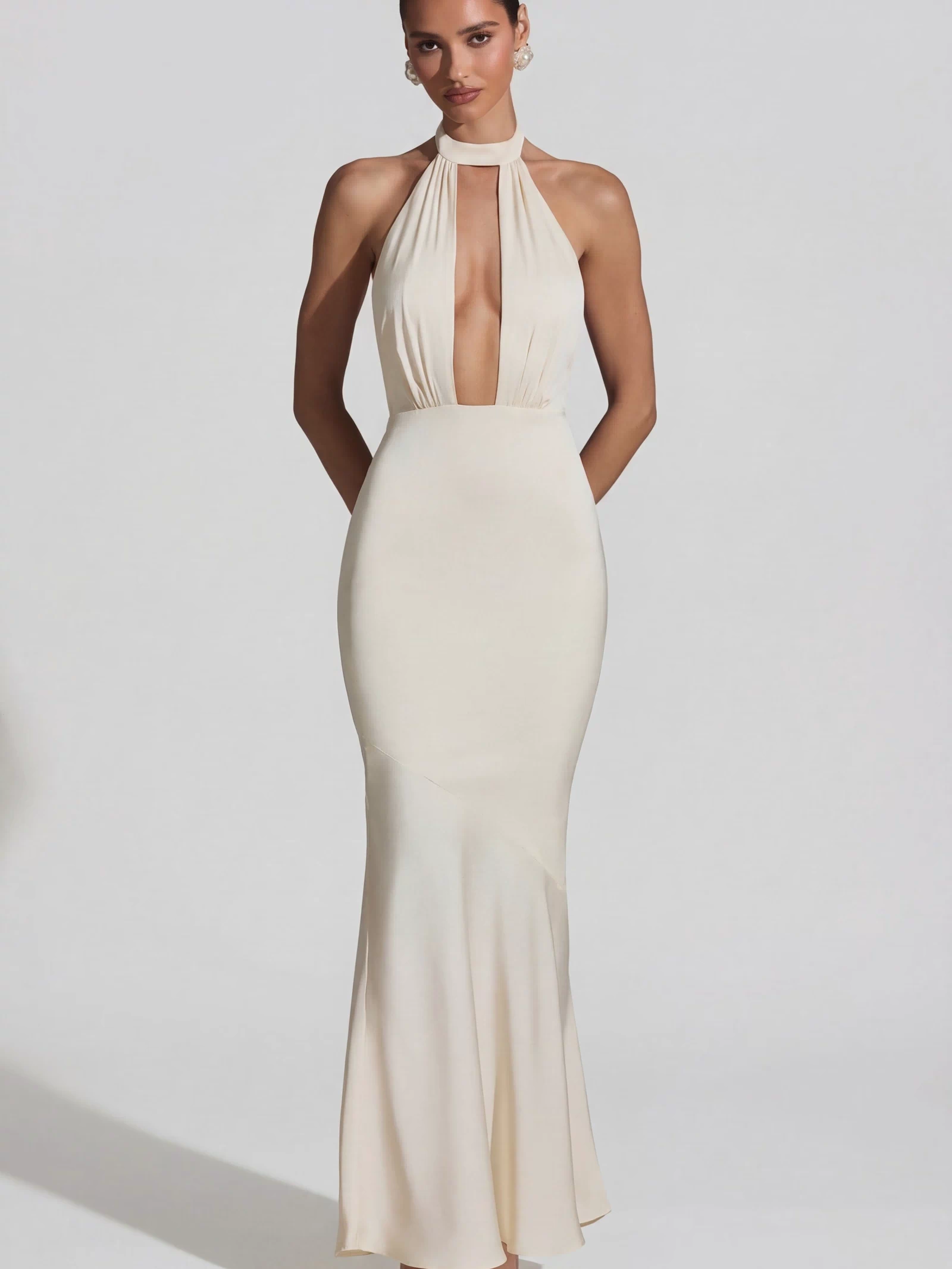 Oh Polly's Priscilla wearing the Desiree Gown Length Dress in Ivory Satin fabric perfect for glamorous red carpet