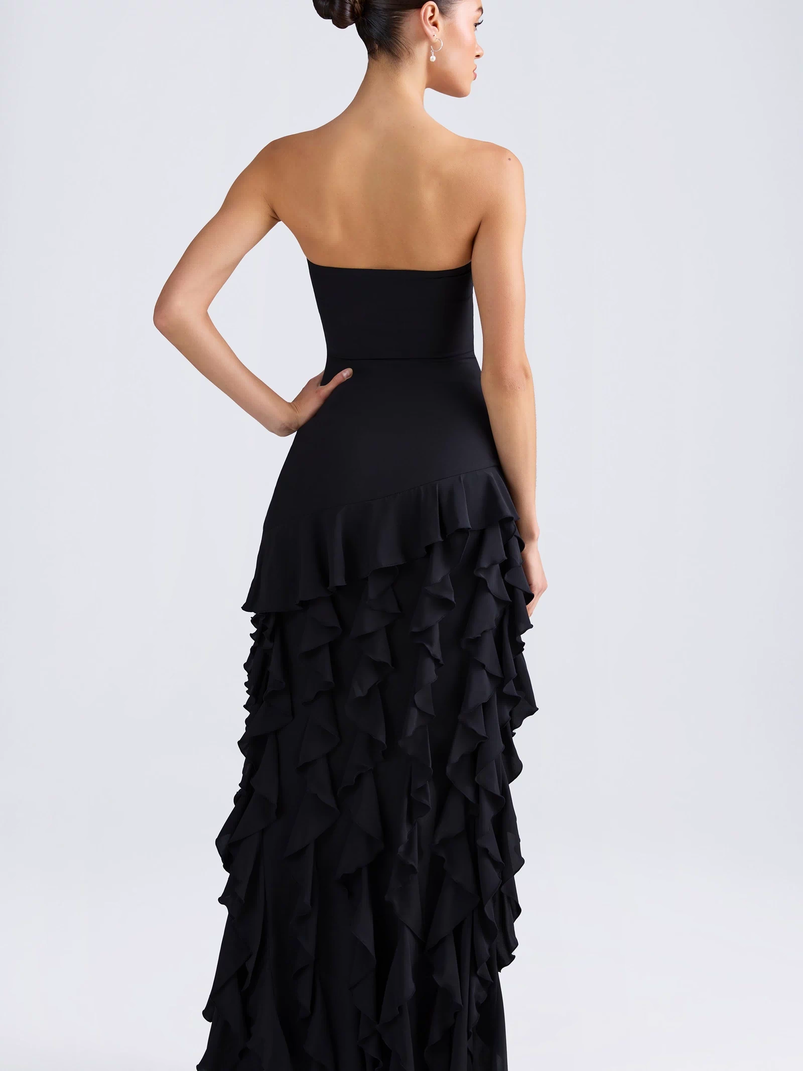 Oh Polly model Anna wearing the Diletta Gown Length Dress in Black Chiffon fabric perfect for formal evening parties