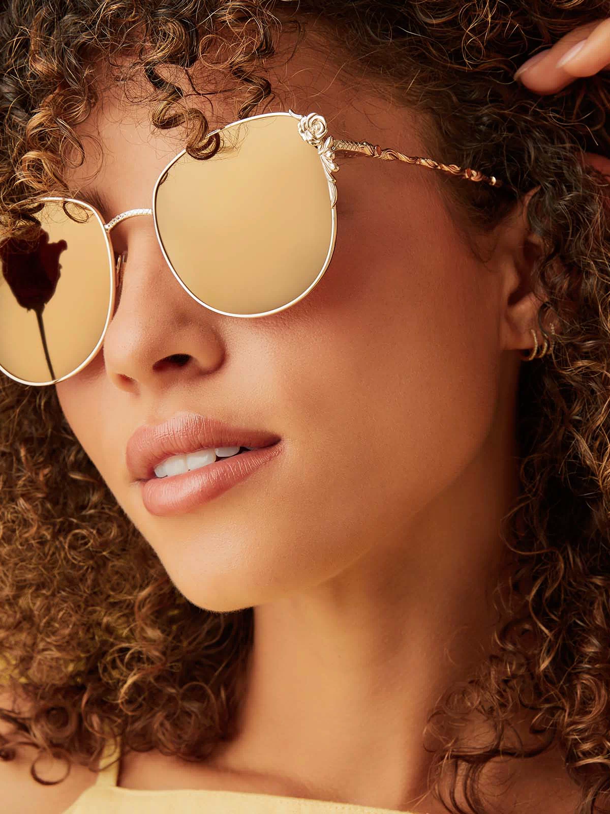 on model - female wearing disney princess x diff eyewear featuring the belle square sunglasses with a gold frame and brown lens w/ gold flash polarized lenses angled view
