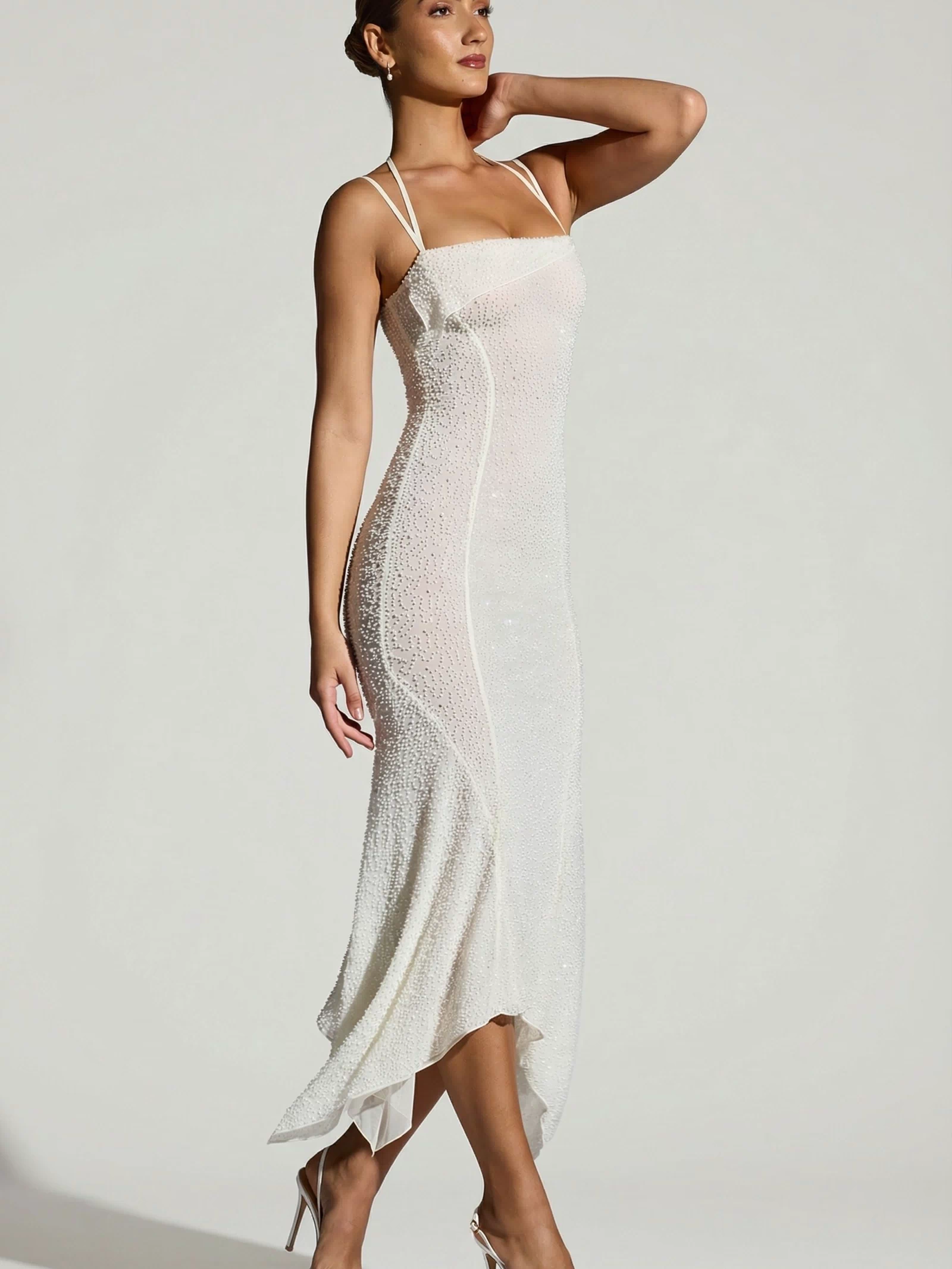 Oh Polly's Priscilla wearing the Dole Maxi Dress in White Embellished fabric perfect for summer garden parties