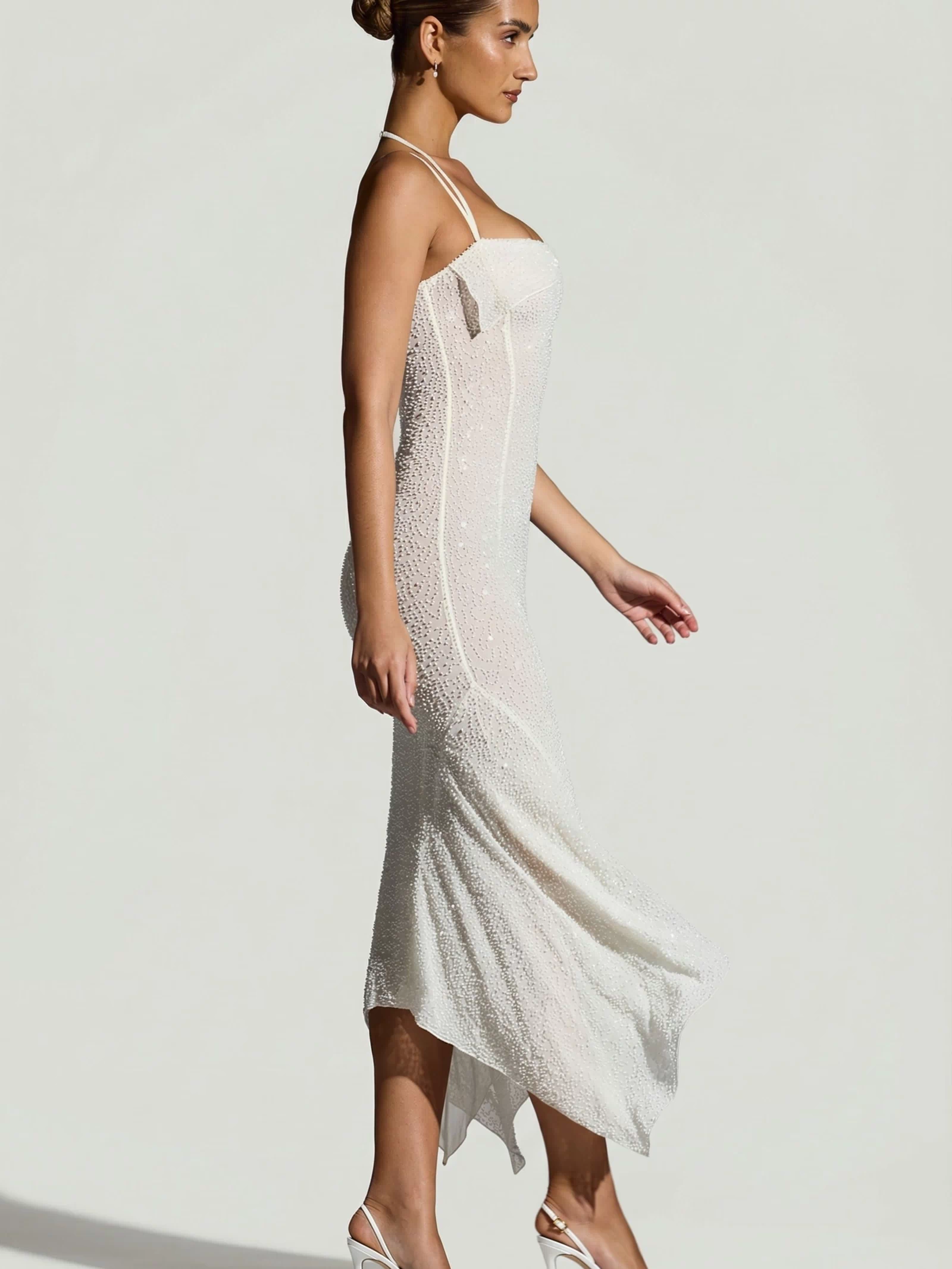 Oh Polly's Priscilla wearing the Dole Maxi Dress in White Embellished fabric perfect for summer garden parties