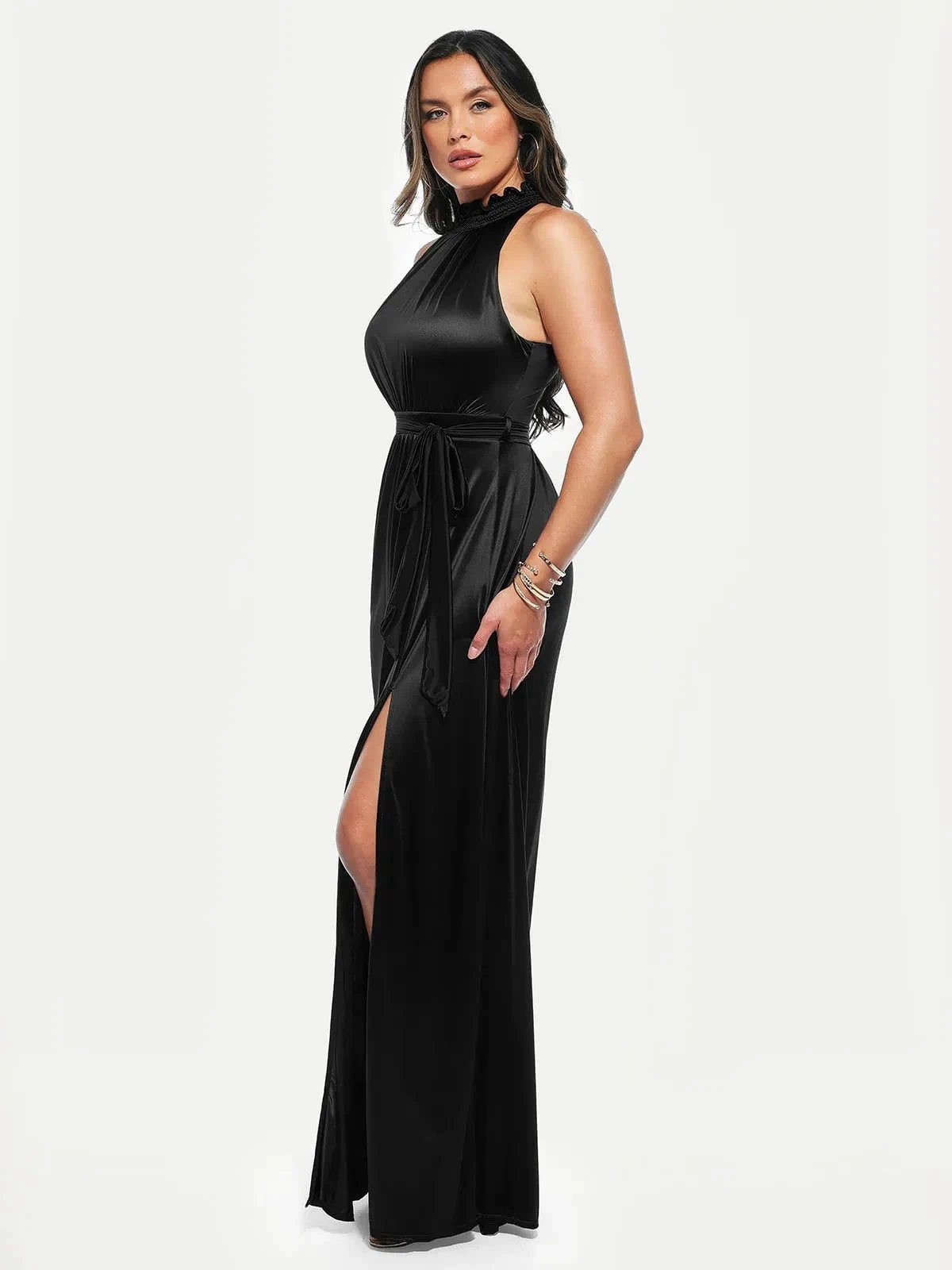 Draped black high neck maxi dress with a high slit and a tie waist.