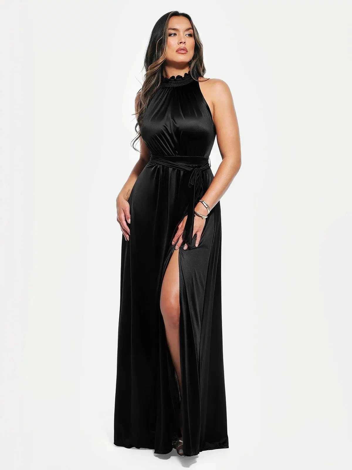 Sleek black maxi dress with high neck, draped bodice, belted waist, and high leg slit.