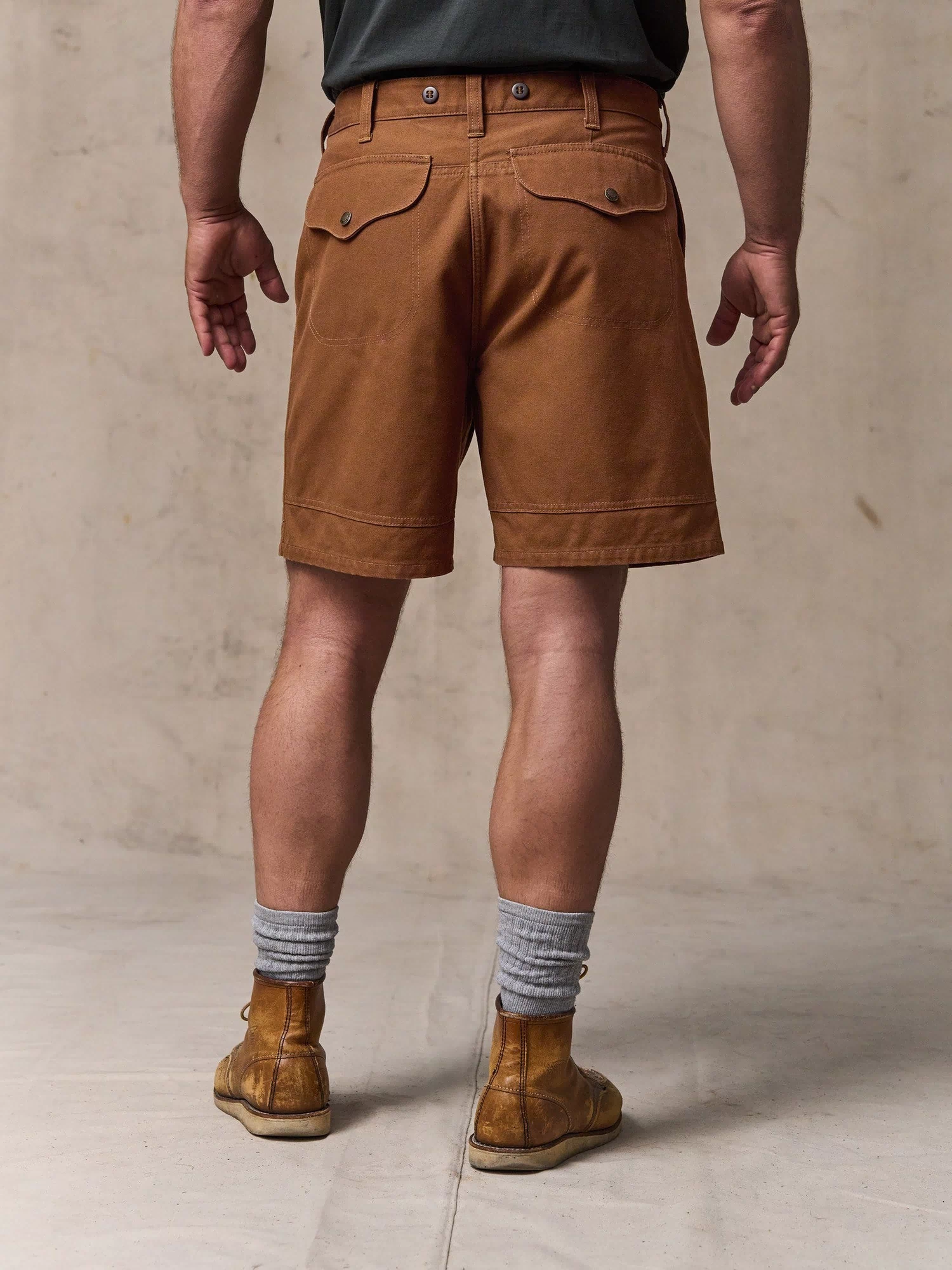 image of a model wearing Filson's Dry Tin Cloth Shorts  - Whiskey