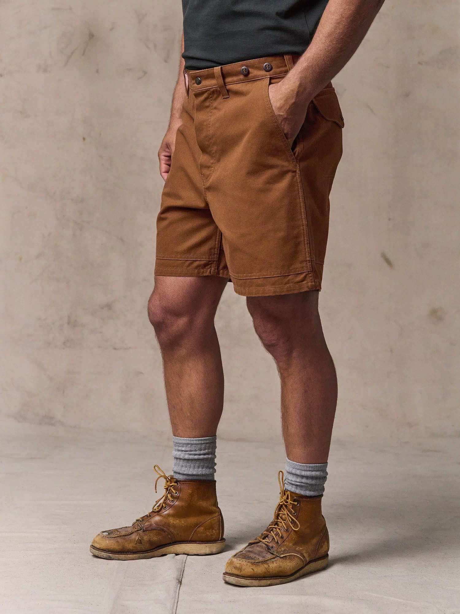 image of a model wearing Filson's Dry Tin Cloth Shorts  - Whiskey