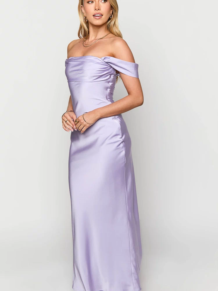 Side view of a lilac off-shoulder maxi dress with a draped neckline and flowing satin skirt