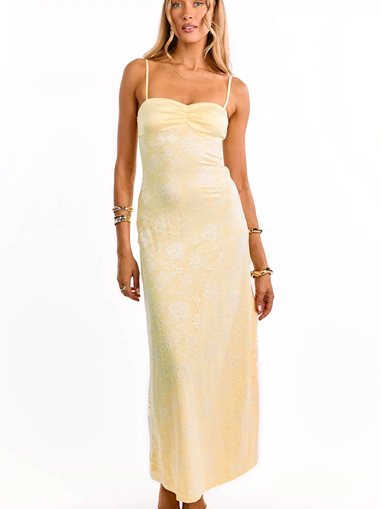 Front view of a yellow lace maxi dress with a ruched bust and thin spaghetti straps